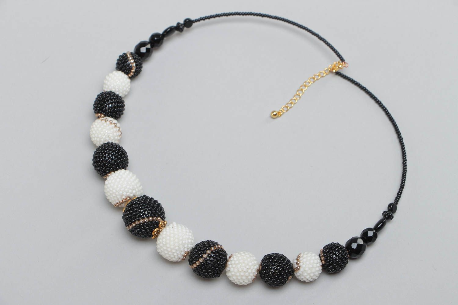 Unusual stylish handmade woven black and white bead necklace photo 2