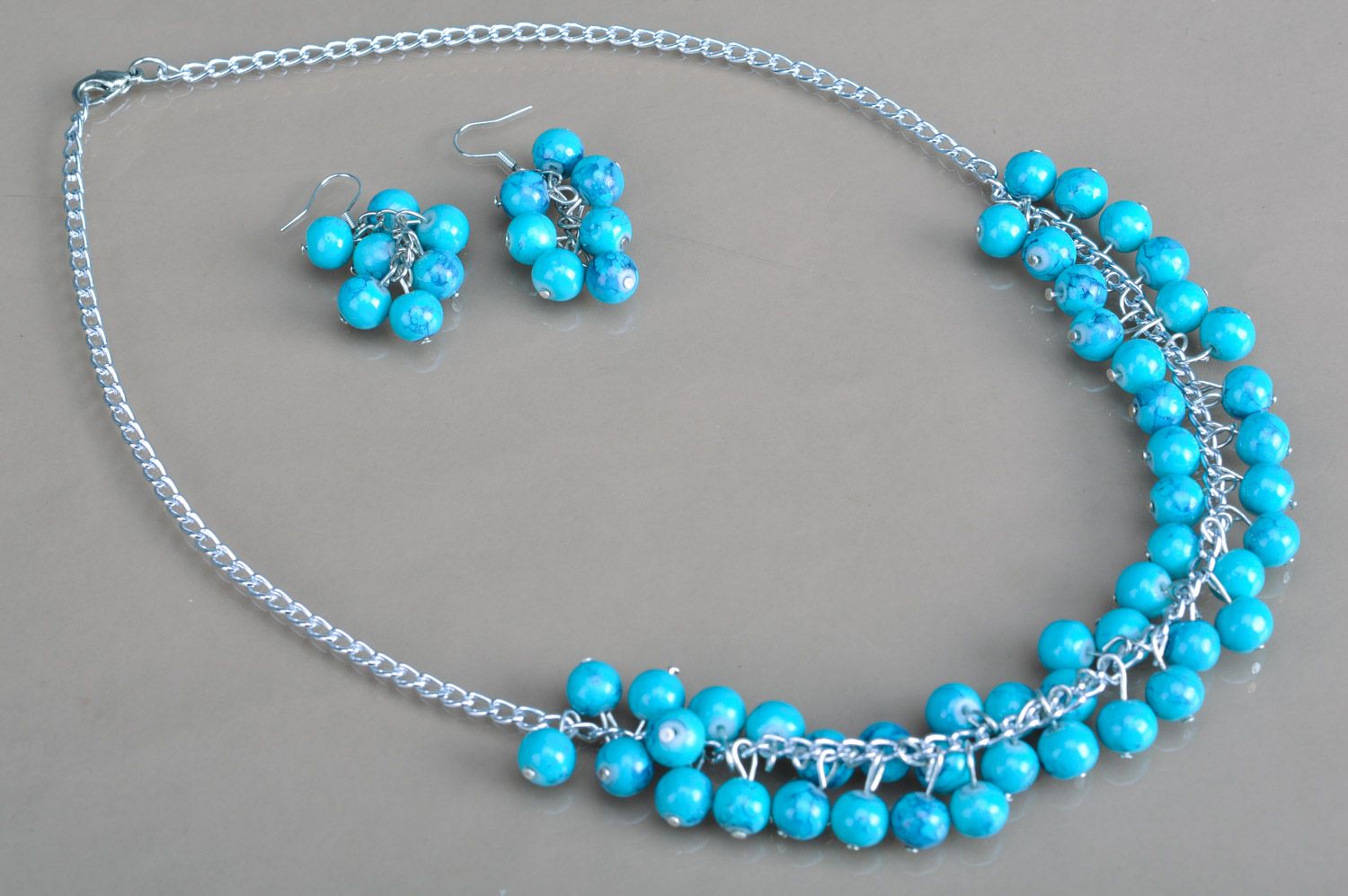 Ensemble de collier et boucles d'oreilles bleu fait main en perles en céramique photo 2