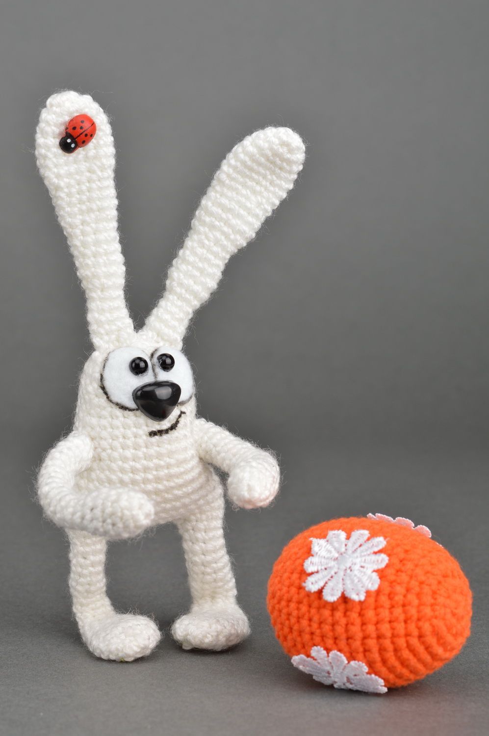 Handmade designer crocheted soft toy funny white rabbit with orange painted egg photo 2