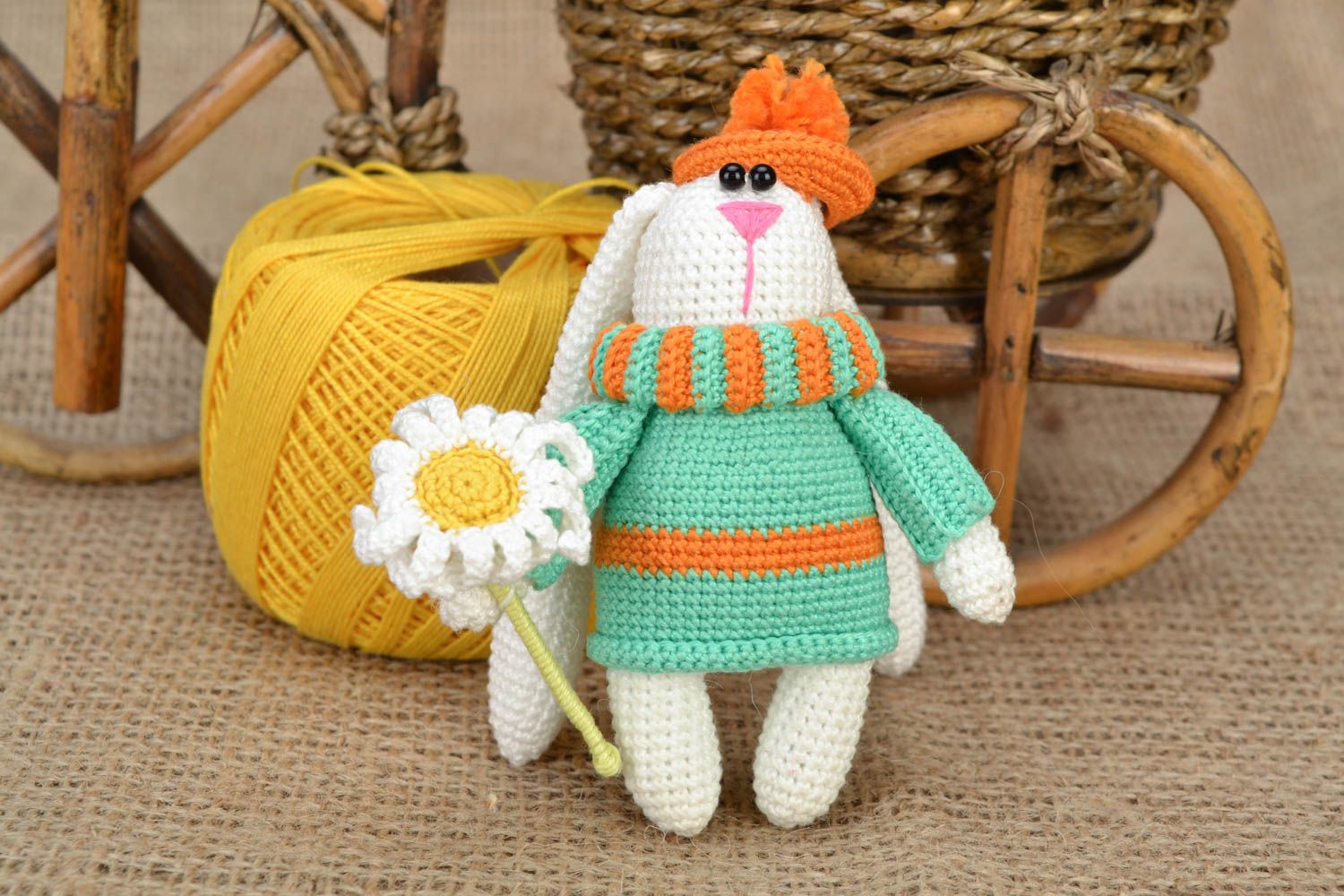 Handmade small soft toy crocheted of cotton threads rabbit in hat with flower photo 1