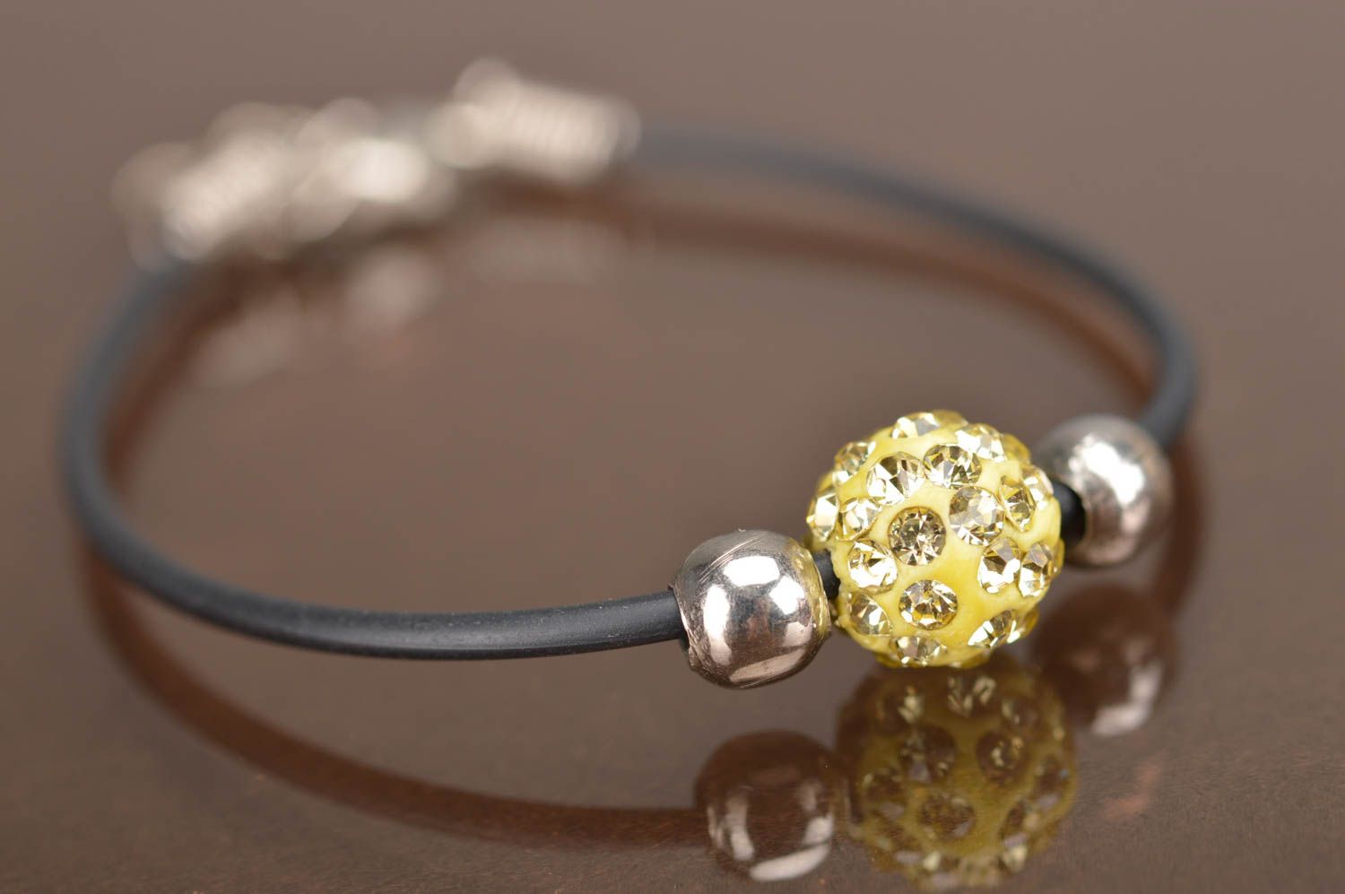 Simple handmade female bracelet made of rubber lace with bead Yellow ball photo 2