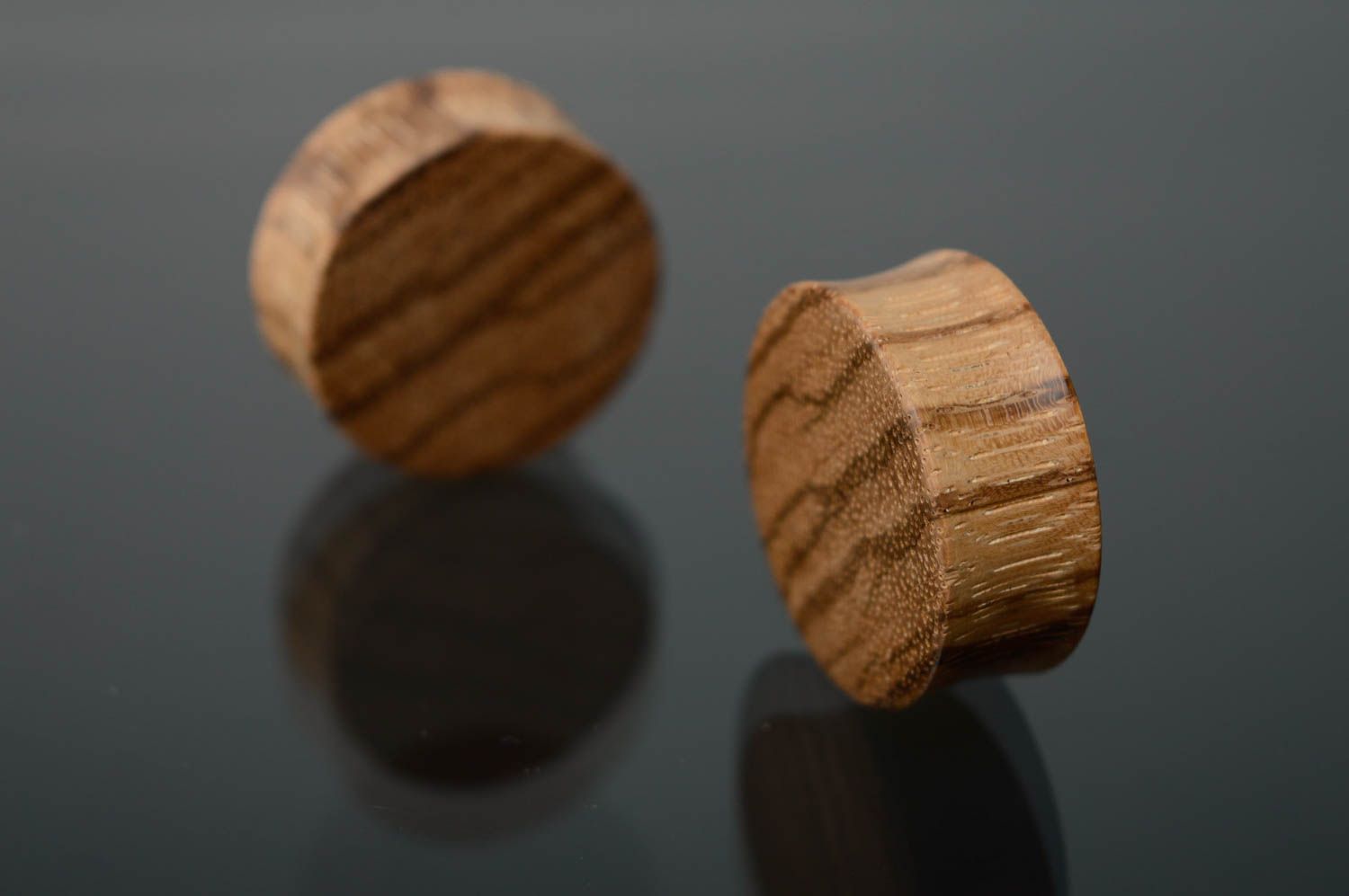 Unusual wooden ear plugs in the shape of buttons photo 2
