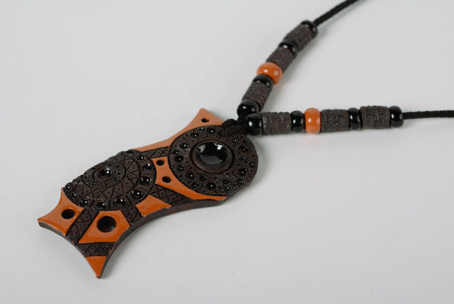 Unusual handmade clay pendant painted with enamel and equipped with cord photo 2
