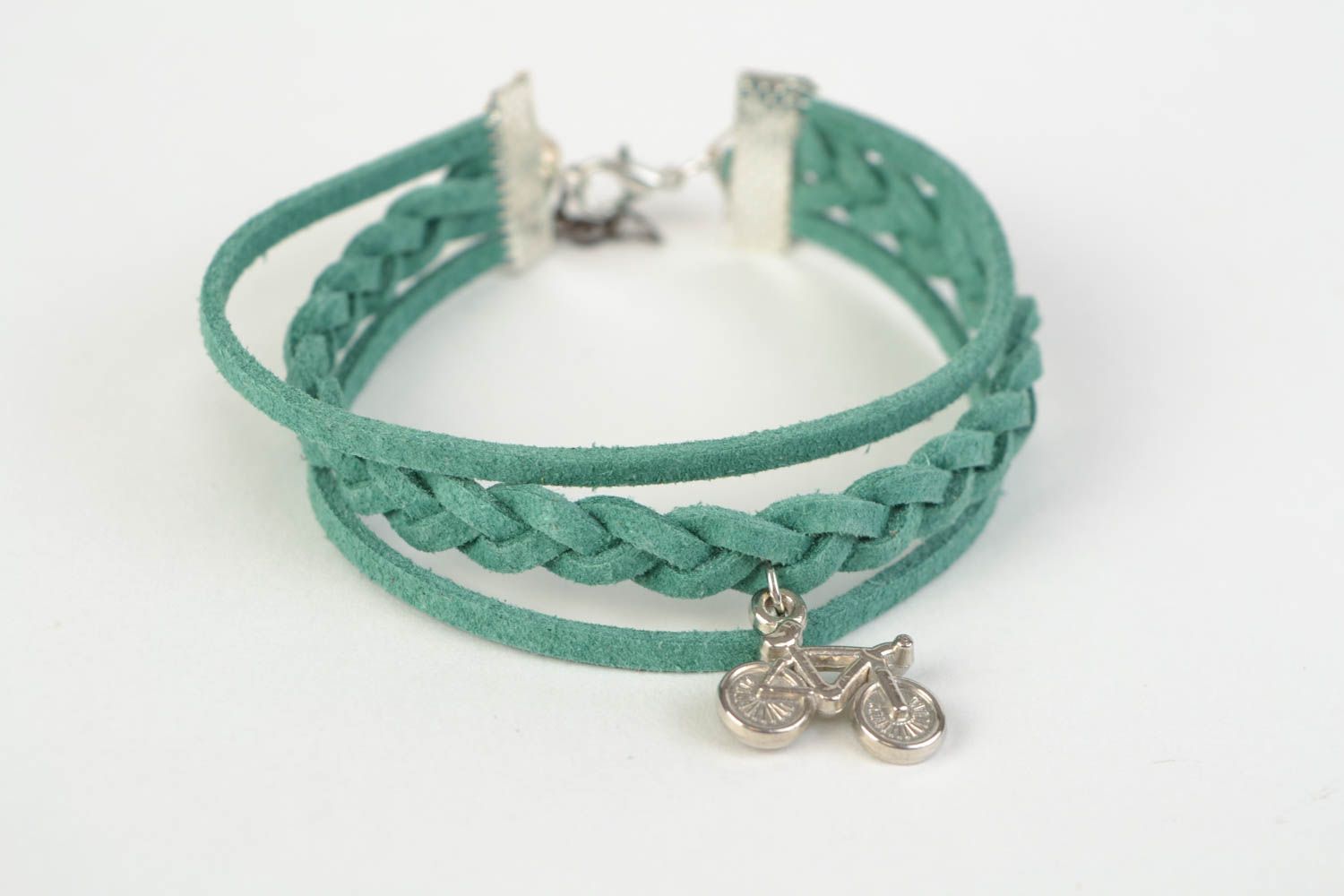 Green handmade woven suede cord bracelet with charm in the shape of bicycle photo 3