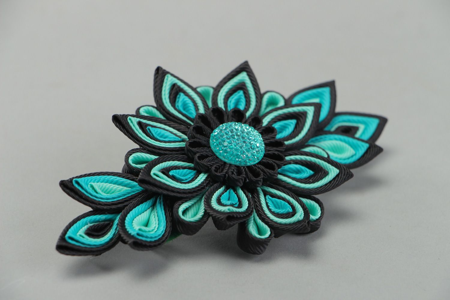 Black and turquoise handmade hair clip with kanzashi flower made of rep ribbons photo 1