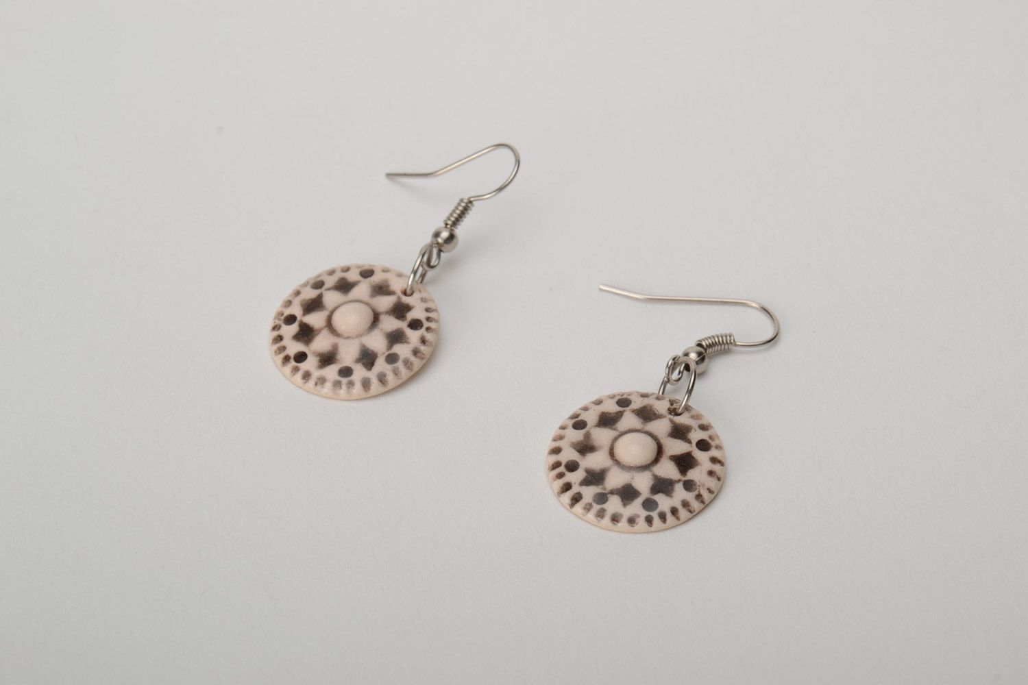 Light round earrings with ornament hand made of white clay for women photo 5