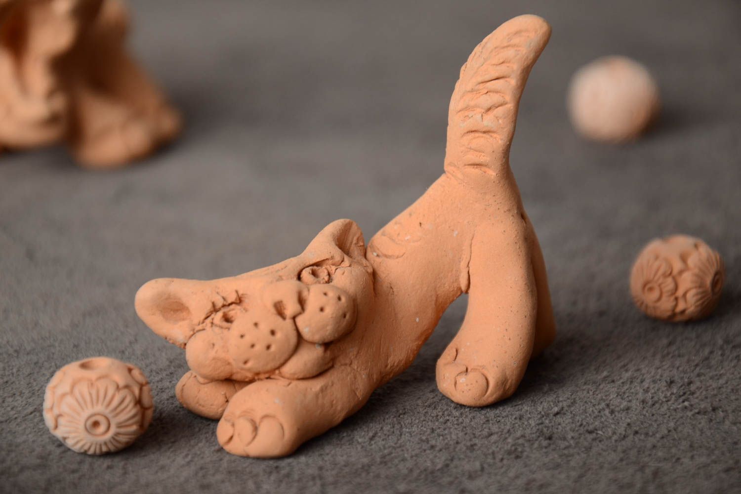 Handmade designer ceramic figurine of playful cat for home decor photo 1