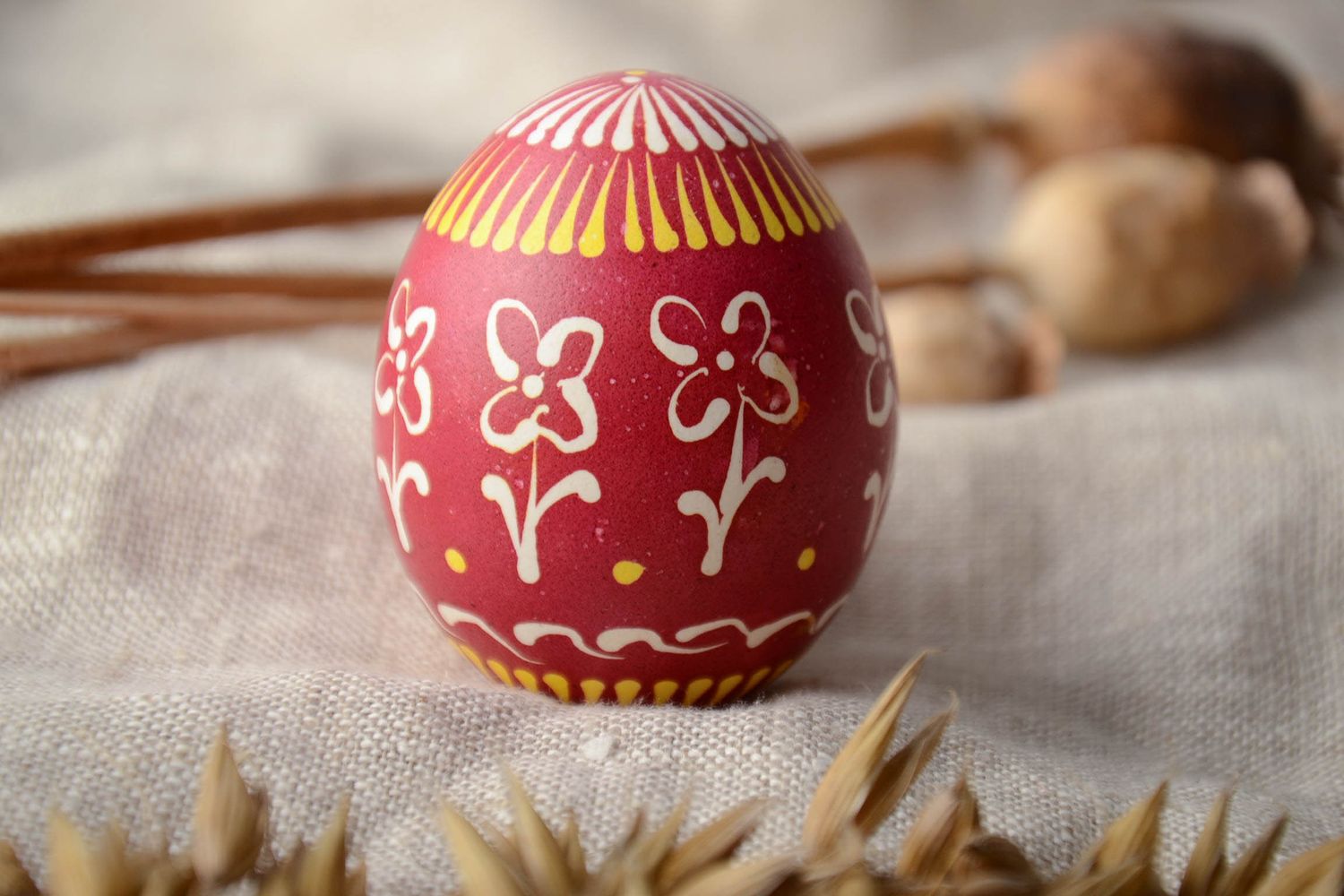 Painted egg in Lemkiv style of red color photo 1