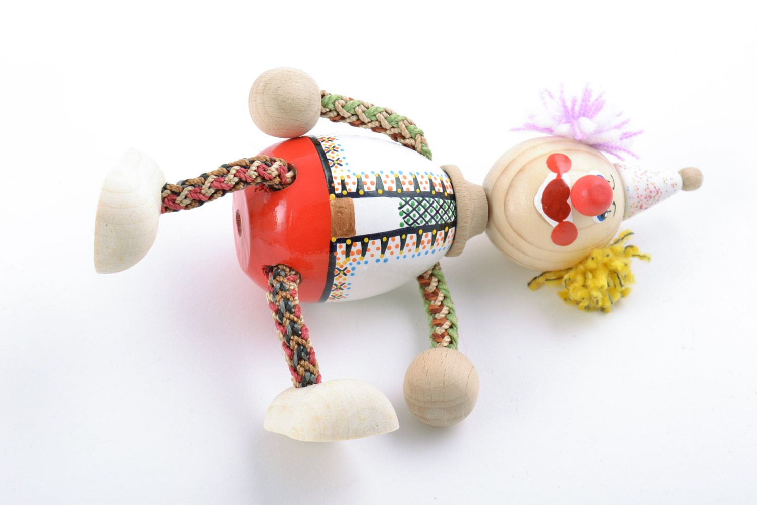 Bright designer homemade painted wooden toy in the shape of clown  photo 4