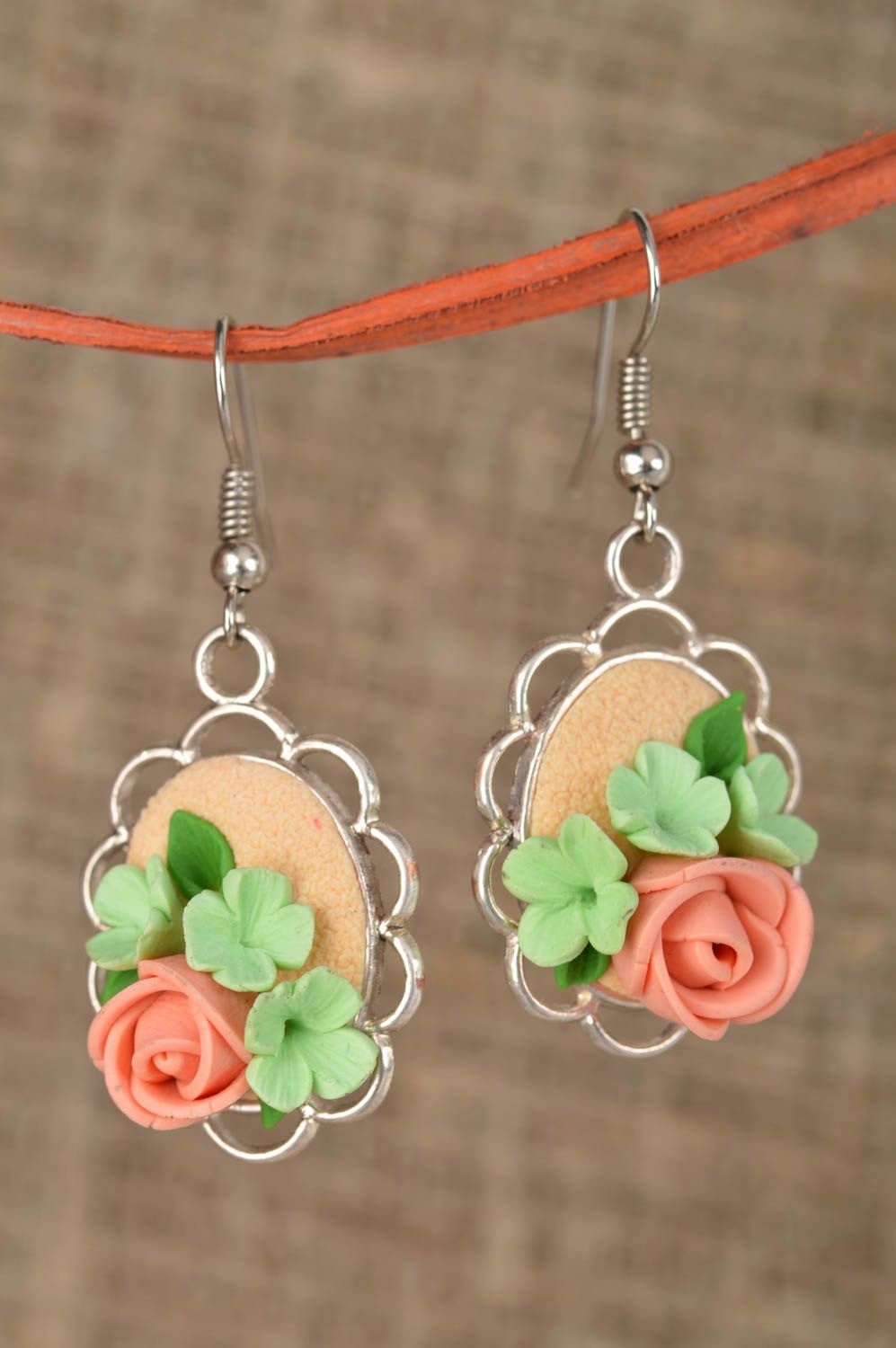 Earrings with flowers made of polymer clay on metal base in pastel colors photo 1