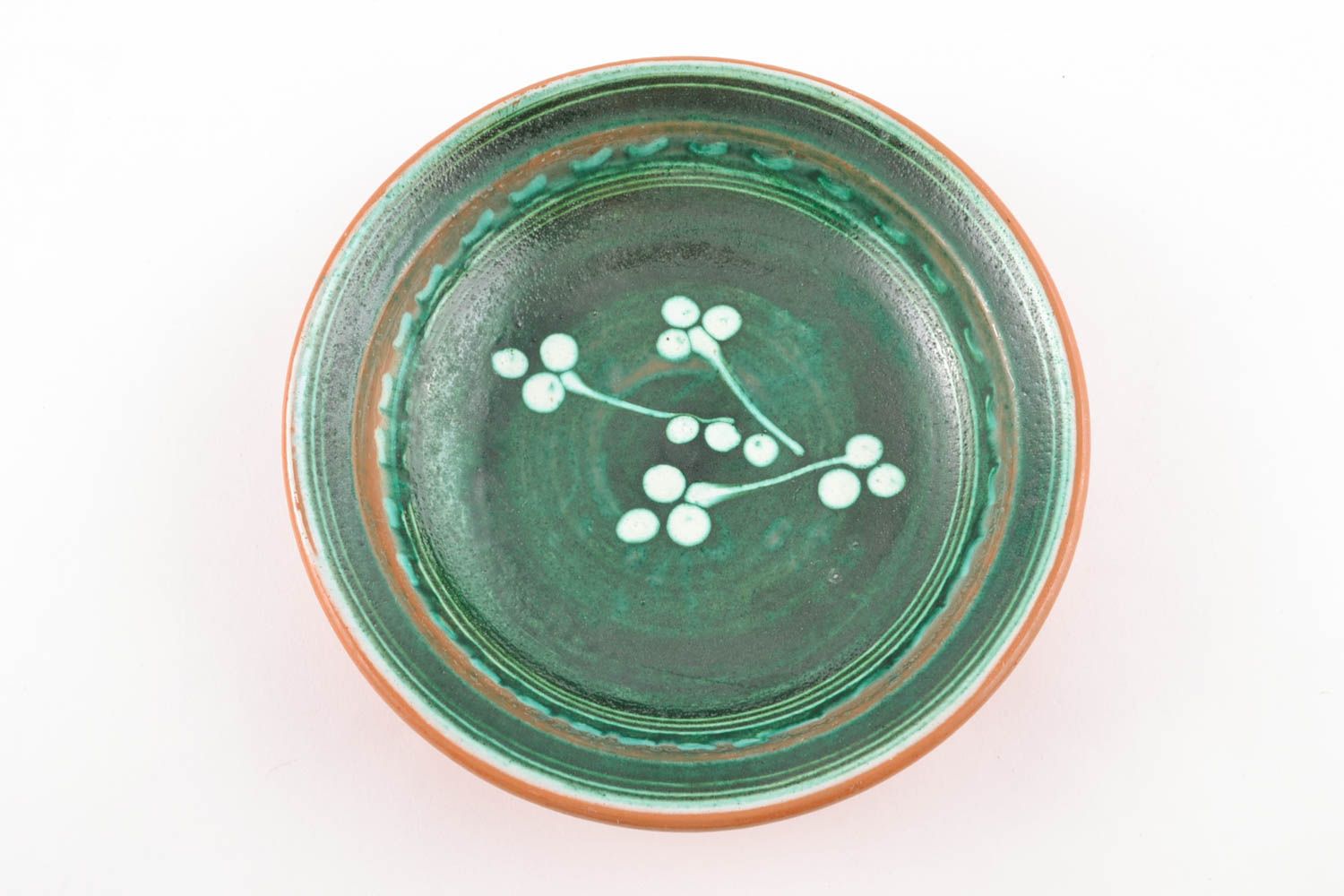 Green ceramic bowl painted using flyandrovka technique photo 2