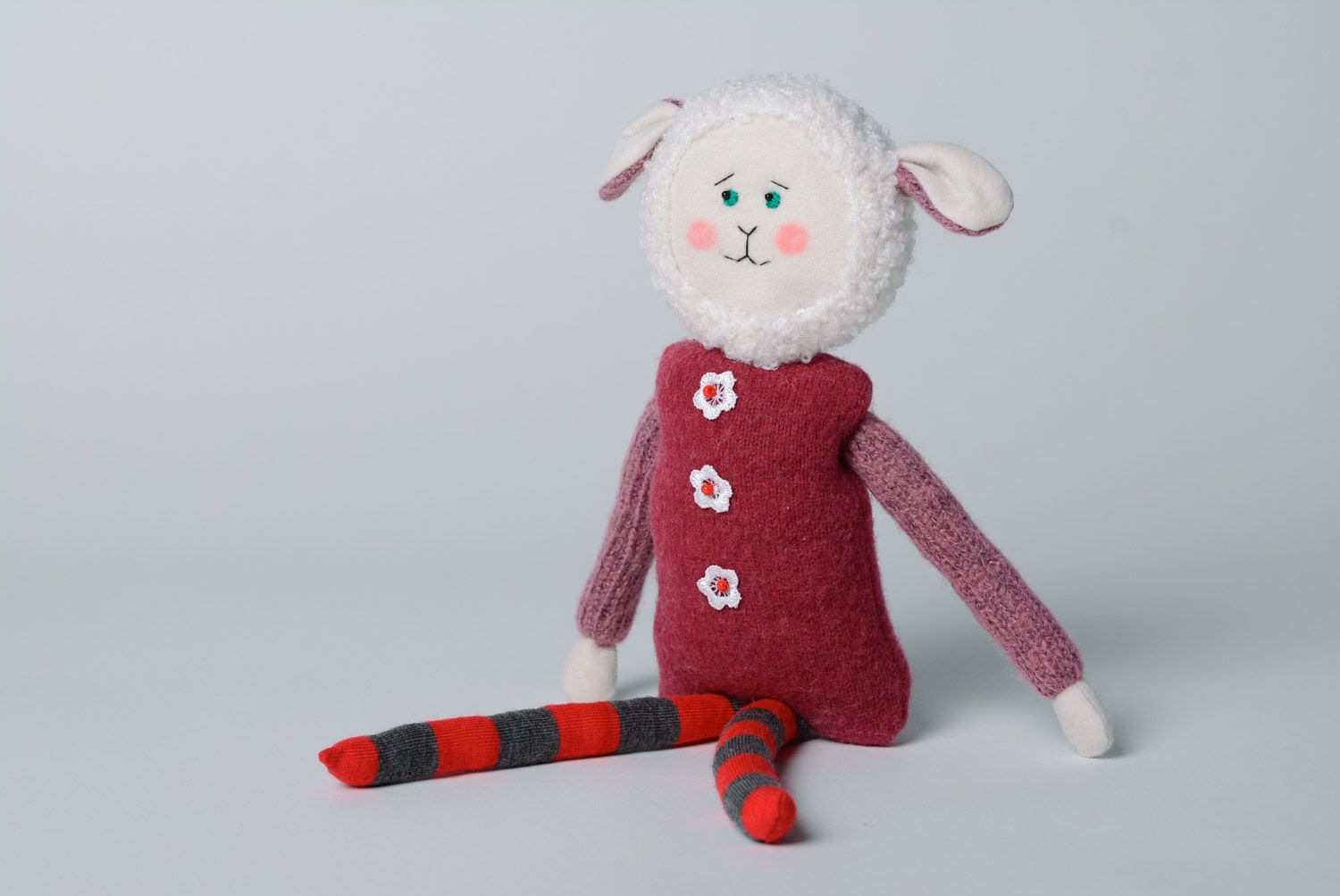 Cute handmade soft toy sewn of jersey and wool in the shape of lamb in coat photo 1