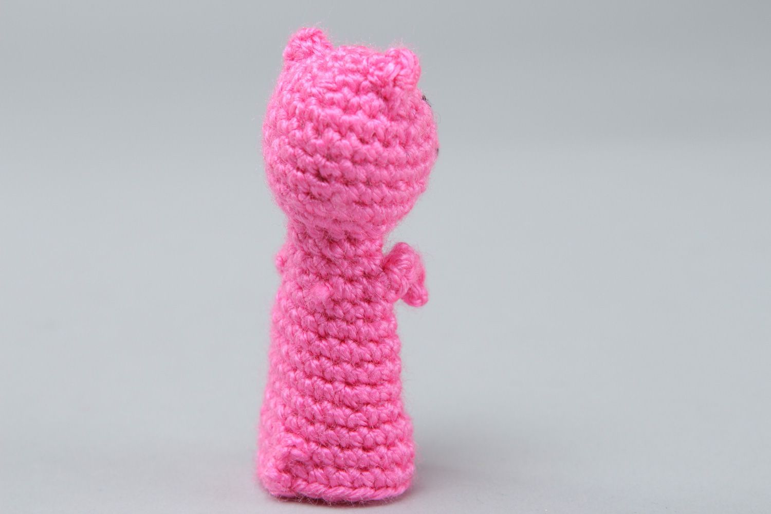 Handmade finger puppet in the shape of pink pig crocheted of acrylic threads photo 2