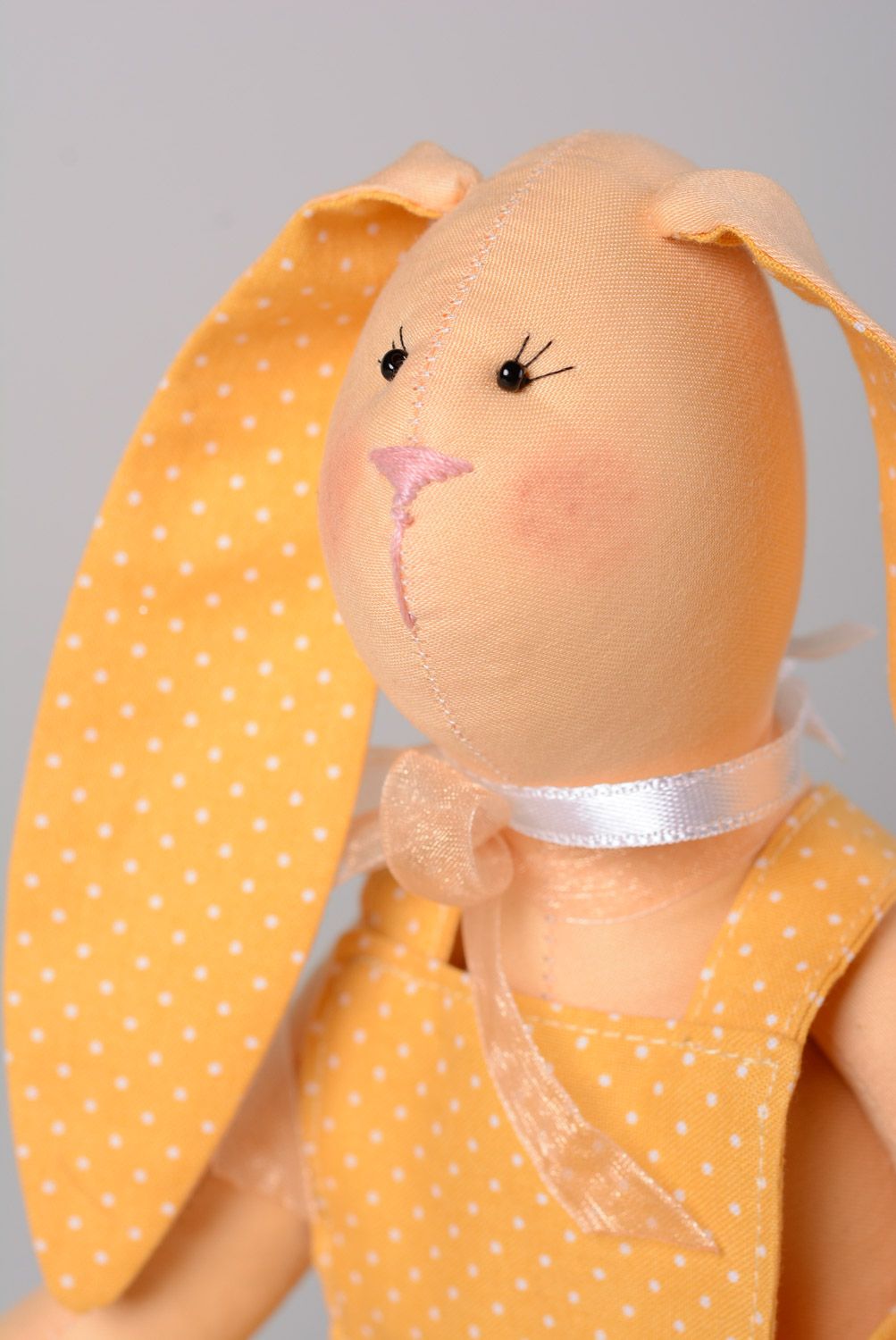 Handmade designer soft toy sewn of natural fabrics in yellow color palette Rabbit photo 2