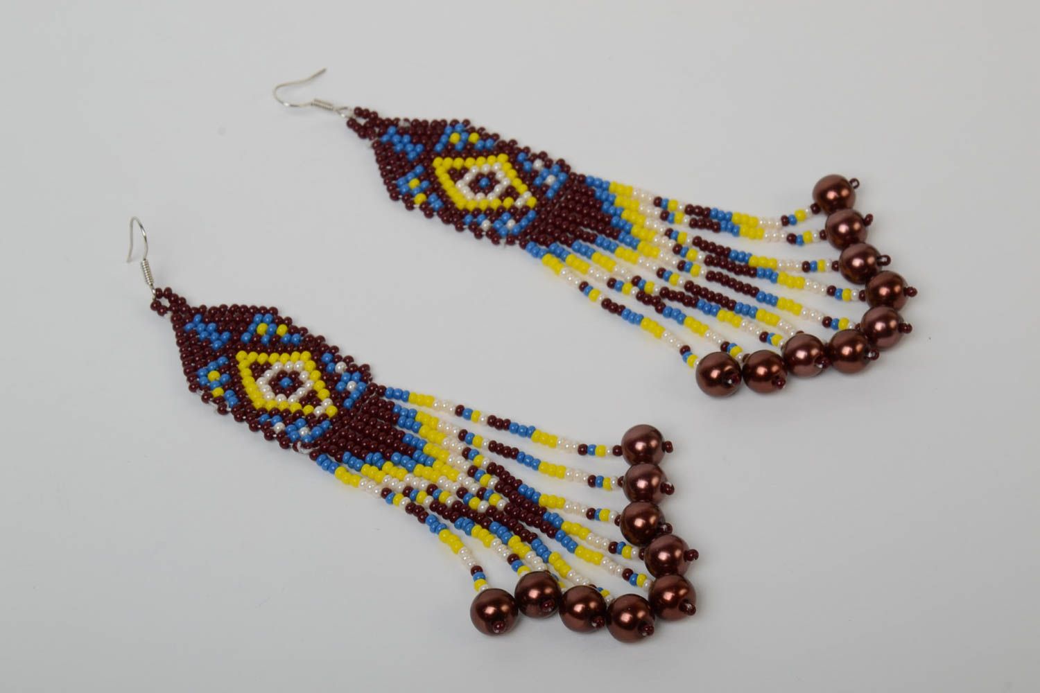 Beautiful handmade designer long earrings with beaded fringe and ethnic ornament photo 2