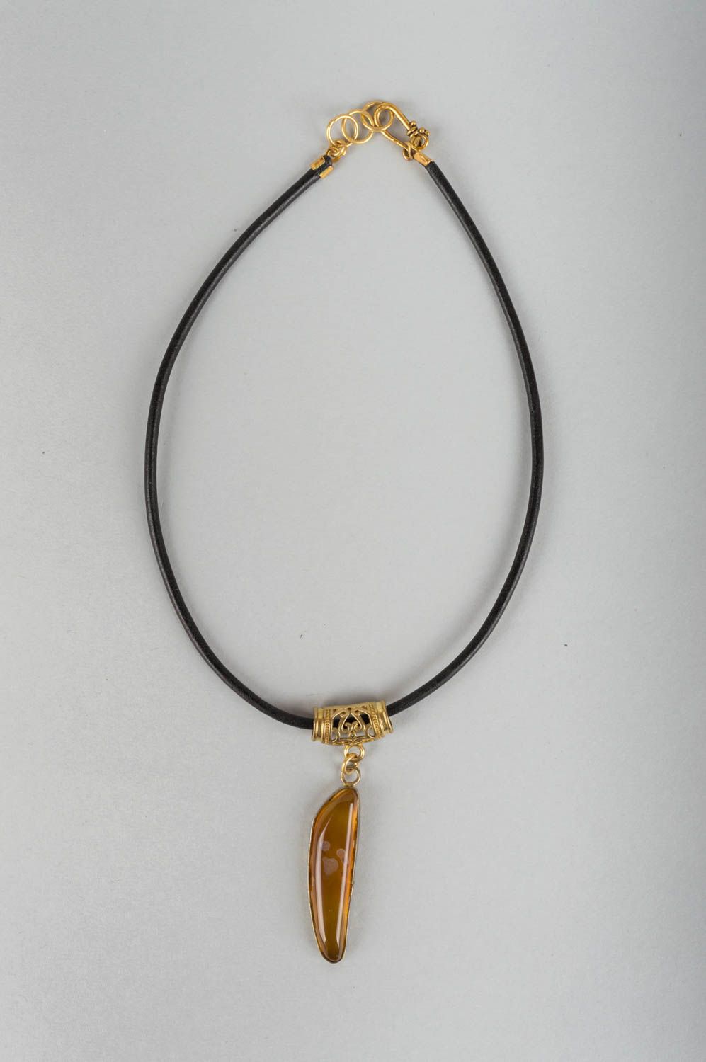 Beautiful stylish handmade neck pendant with natural stone on leather cord photo 2