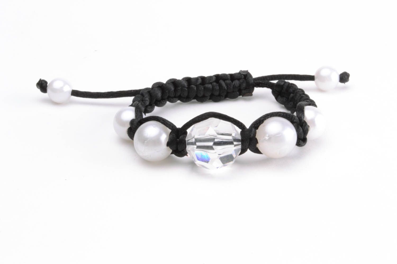 Braided bracelet with white beads photo 3