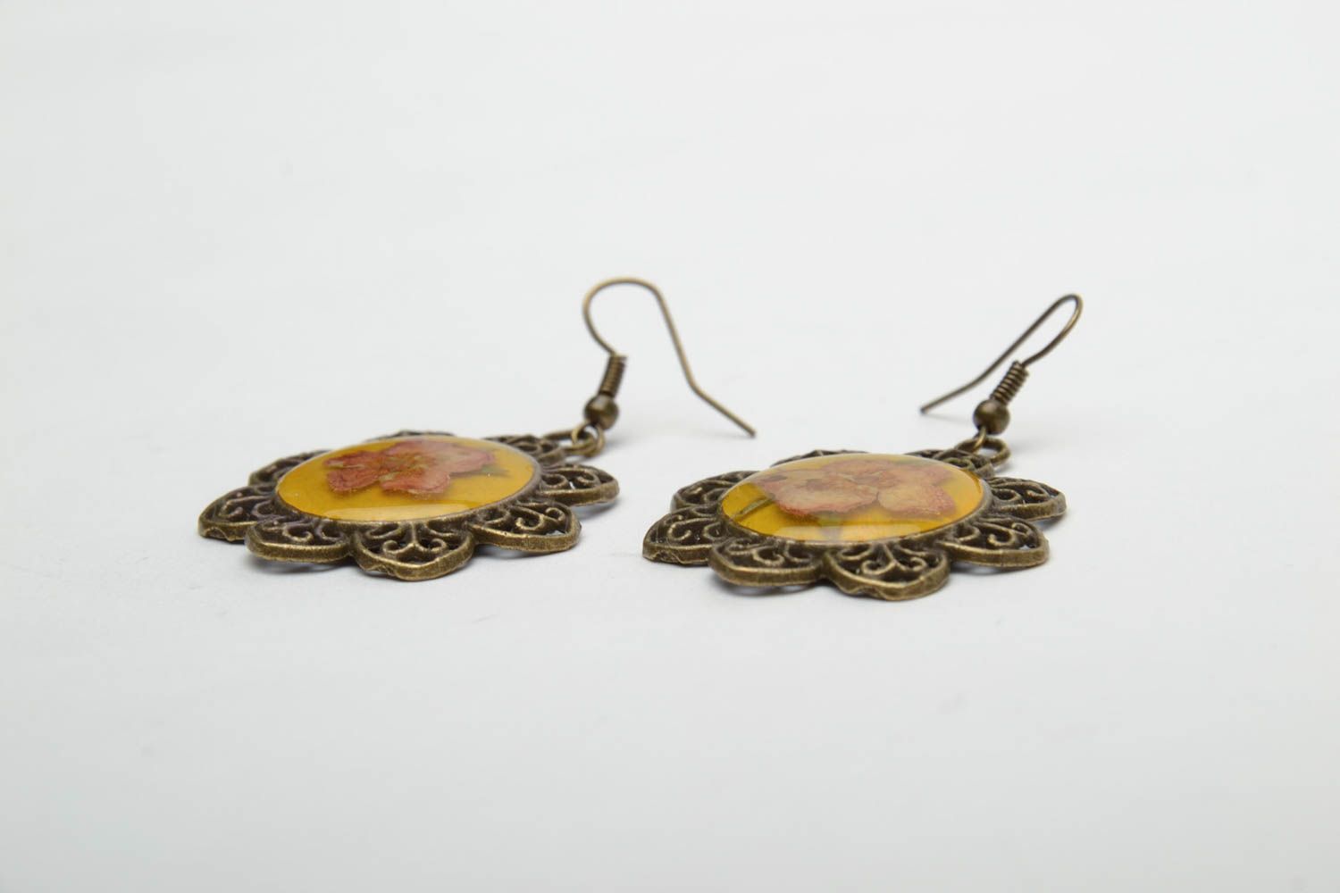 Unusual earrings with natural flowers in epoxy resin photo 4