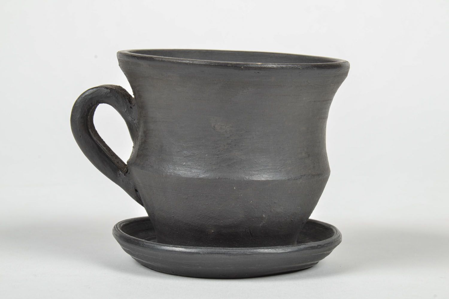 Black clay not glazed coffee cup with handle and saucer photo 2