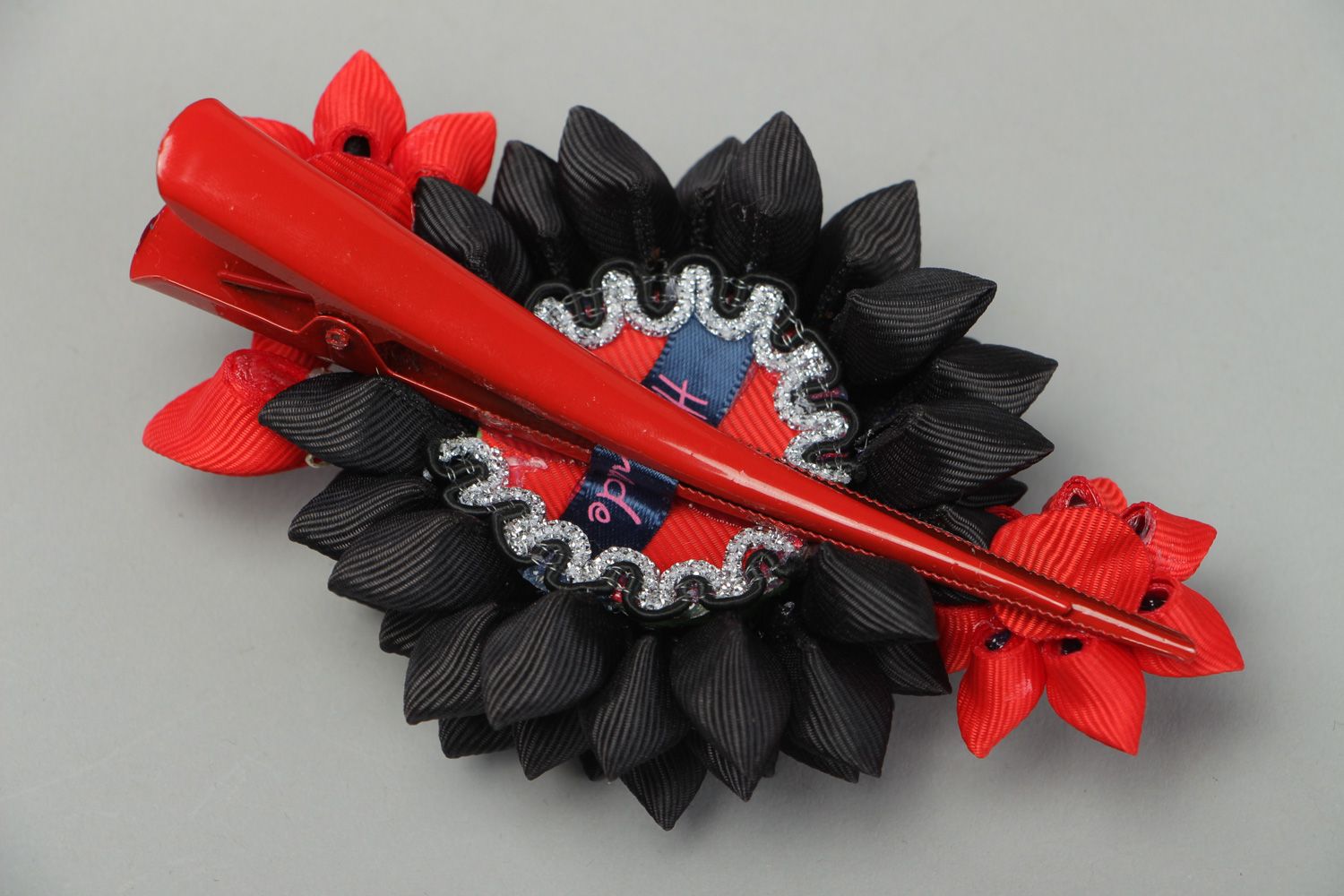 Black and red handmade hair clip with kanzashi flower created of rep ribbons photo 3
