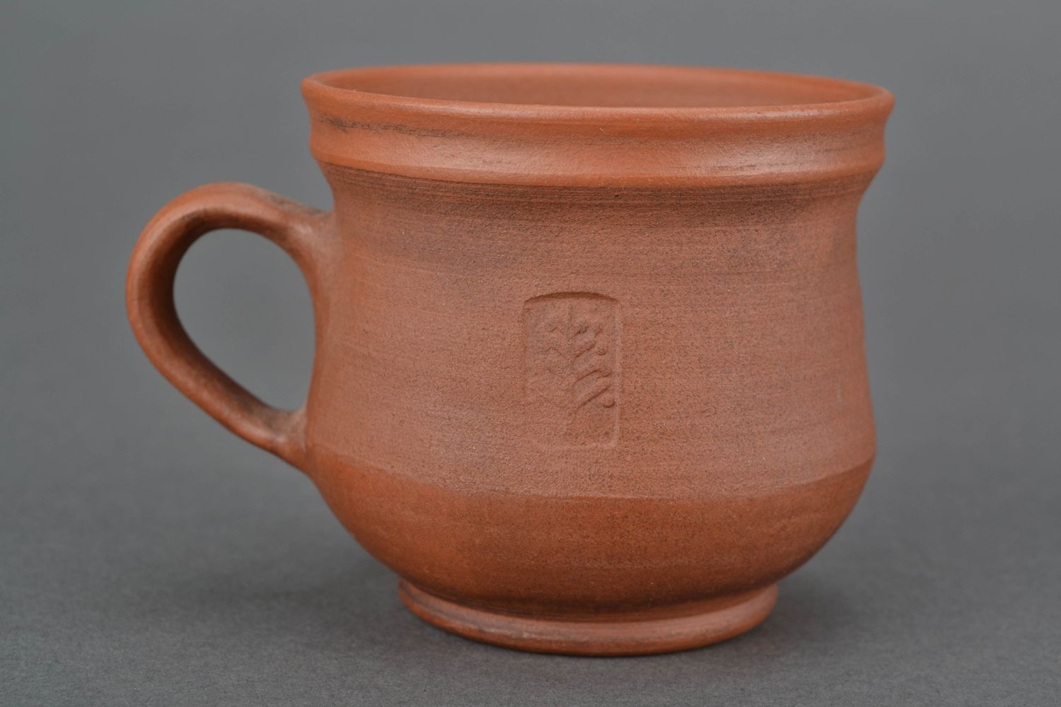Taza cerámica para té o caldo hecha a mano foto 1