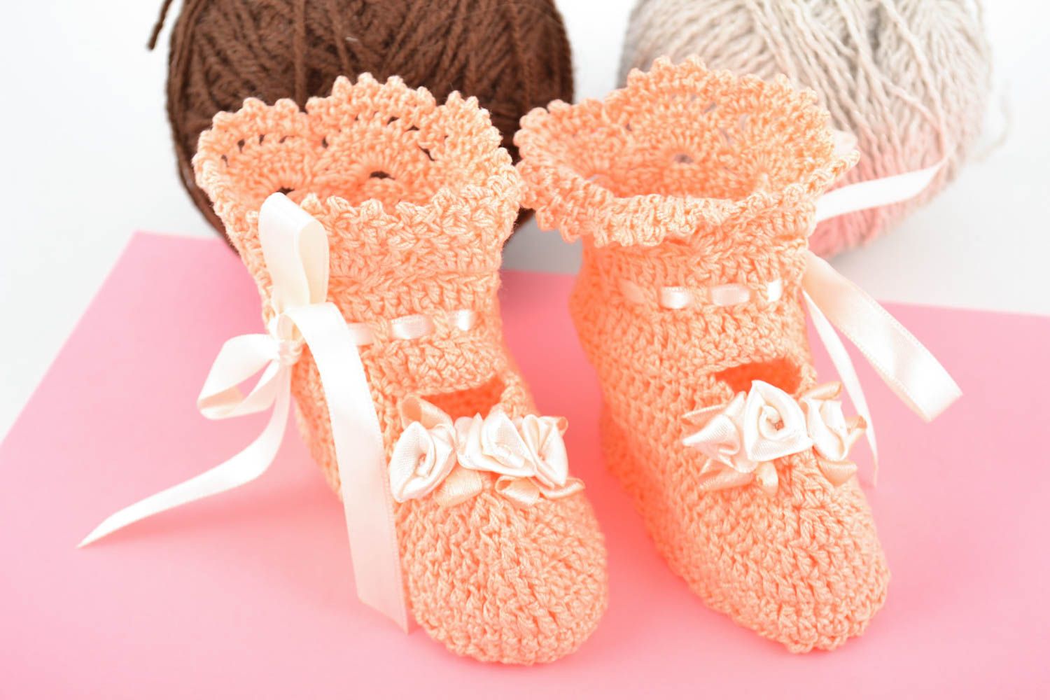 Beautiful handmade pink crochet baby booties with satin bows and flowers photo 1