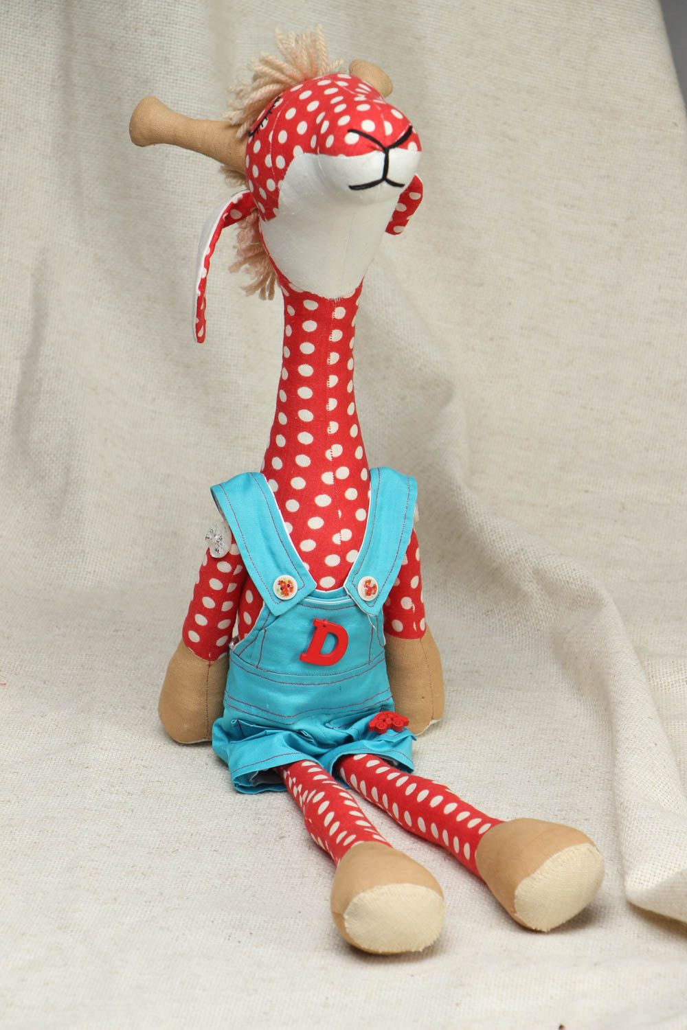 Тканевая игрушка ручной работы Красный жираф в горошек фото 1