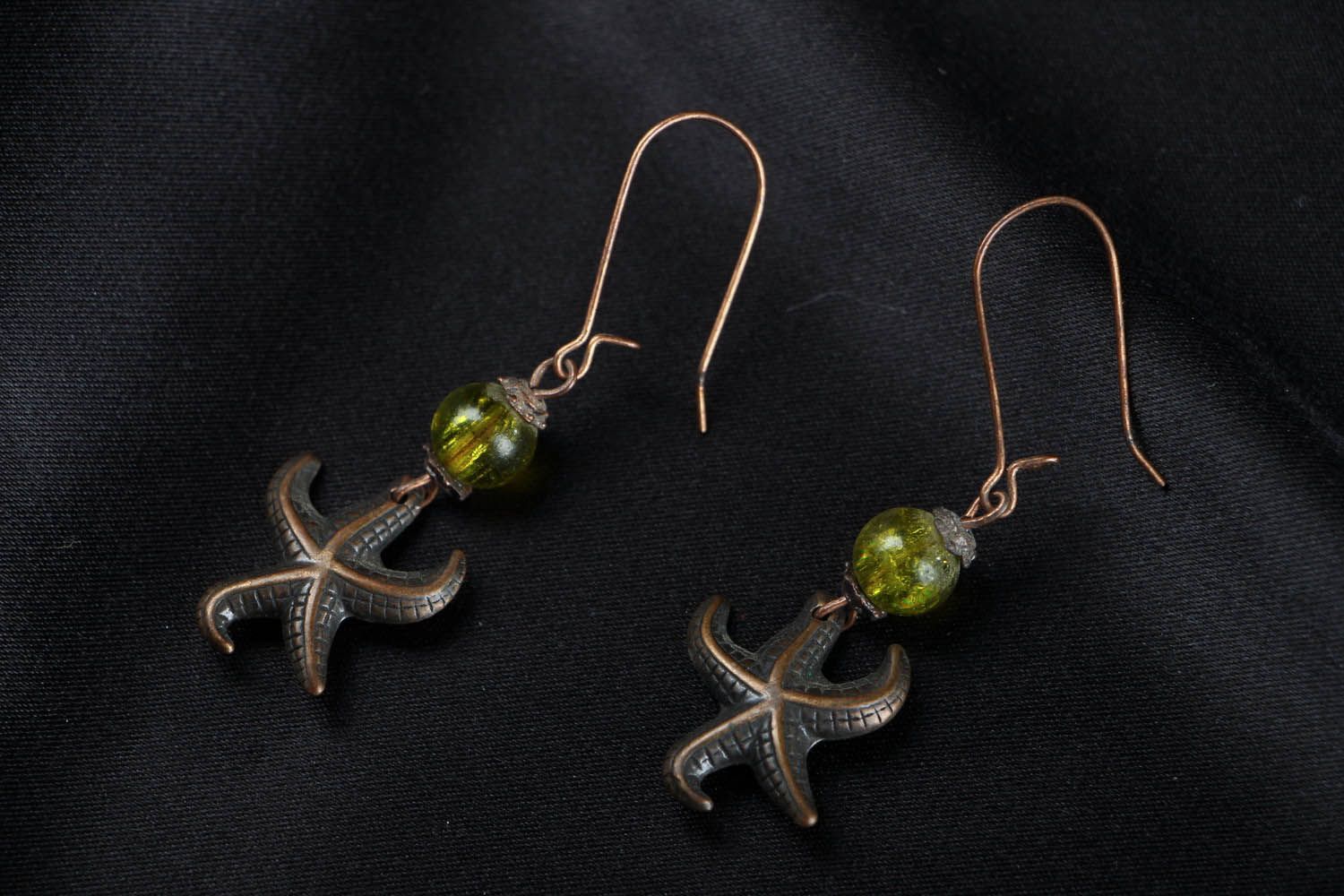 Metal earrings with crystal photo 1