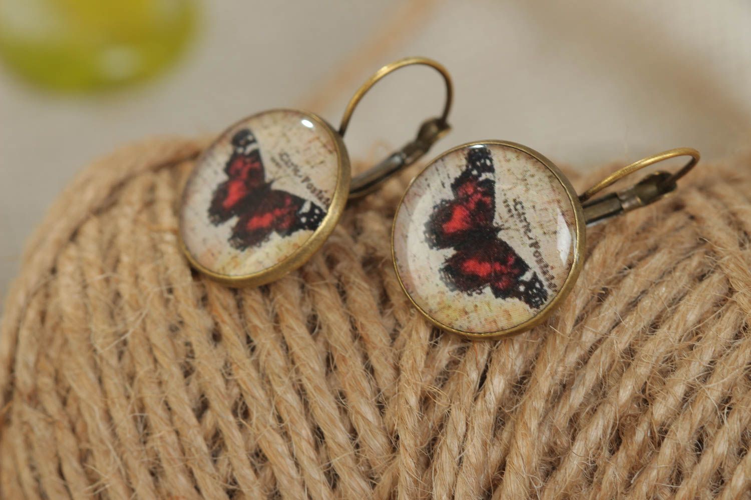 Handmade stylish beautiful earrings made of glassy glaze round with butterfly print photo 1