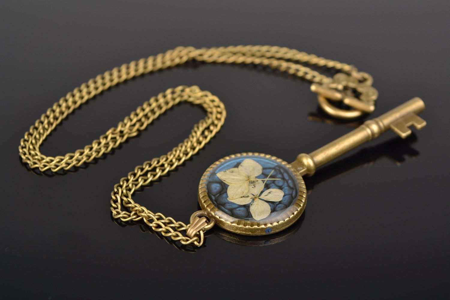 Handmade botanical pendant on long chain with hydrangeas flower coated with epoxy photo 1