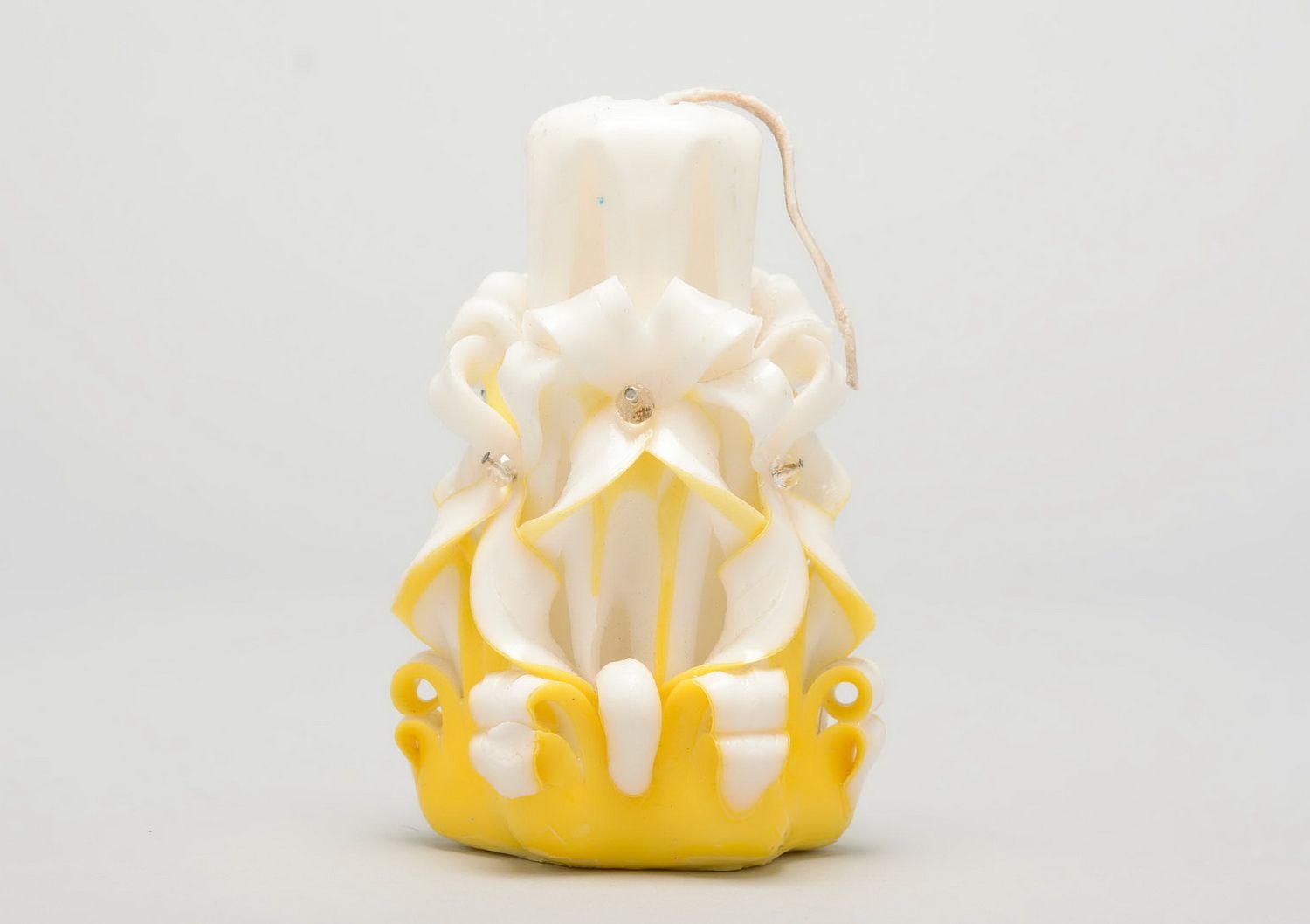 Paraffin wax candle white and yellow photo 1
