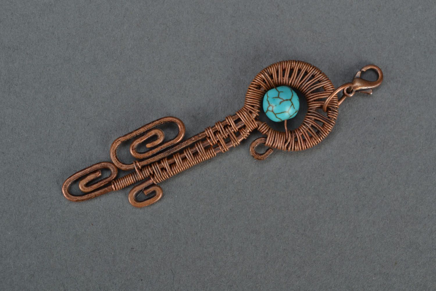 Copper wire pendant with turquoise photo 1