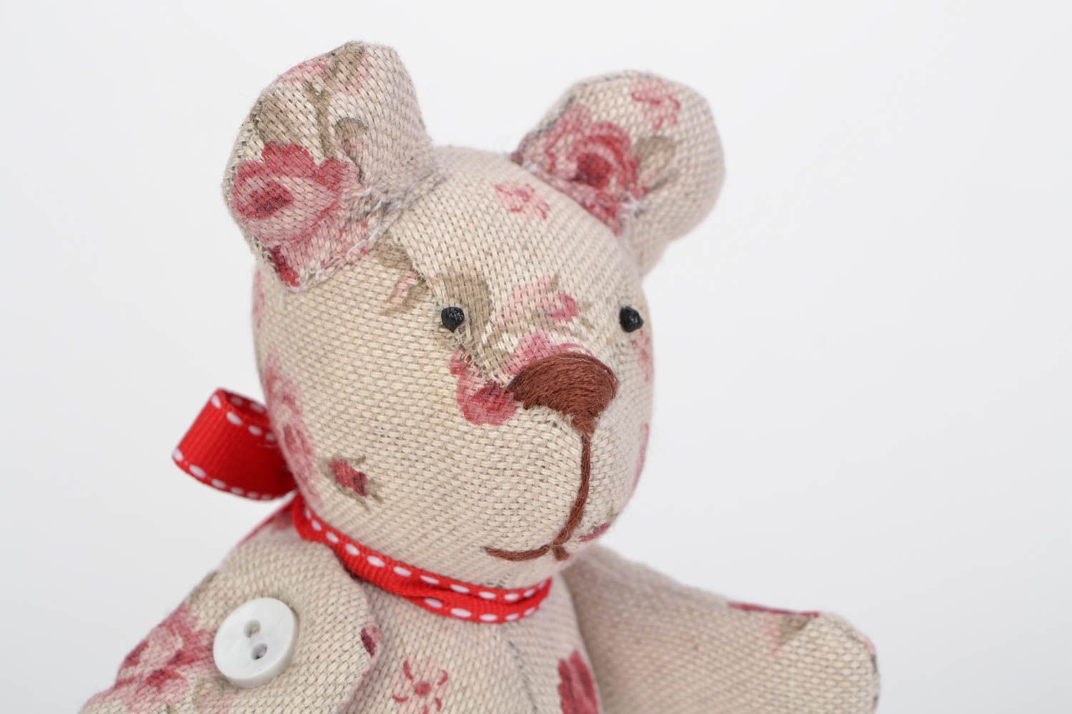 Handmade light fabric soft toy bear with flower print photo 4