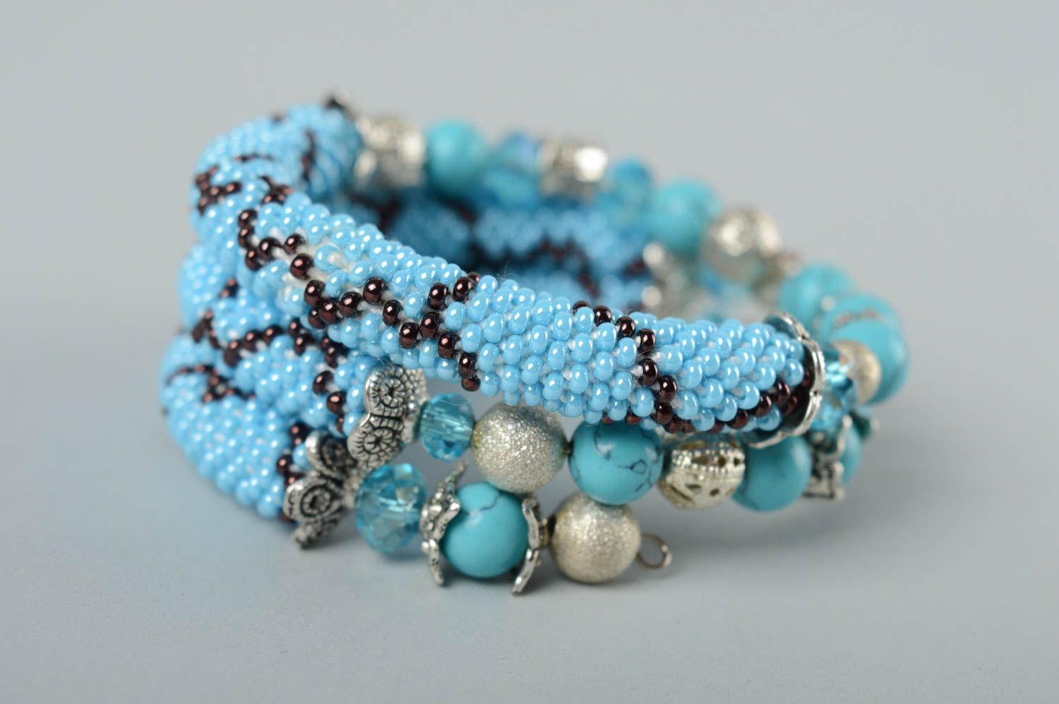 Turquoise beads cord bracelet with metal butterfly charm photo 1