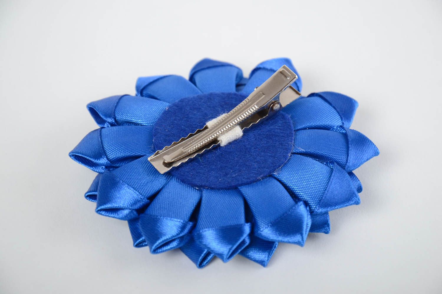Handmade blue and yellow puffy hair clip with a flower of satin ribbons photo 3