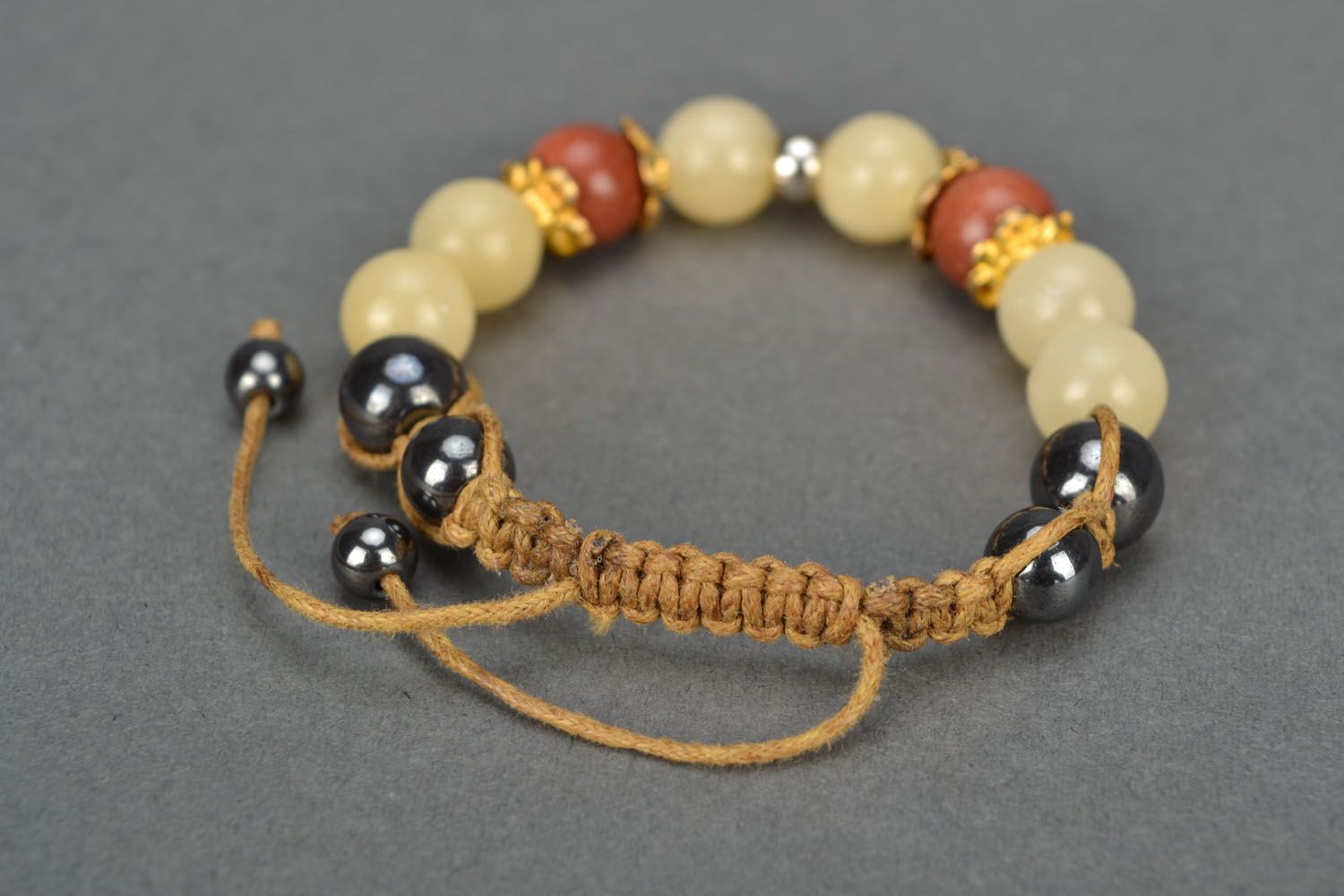 Bracelet with natural stones and cord photo 4