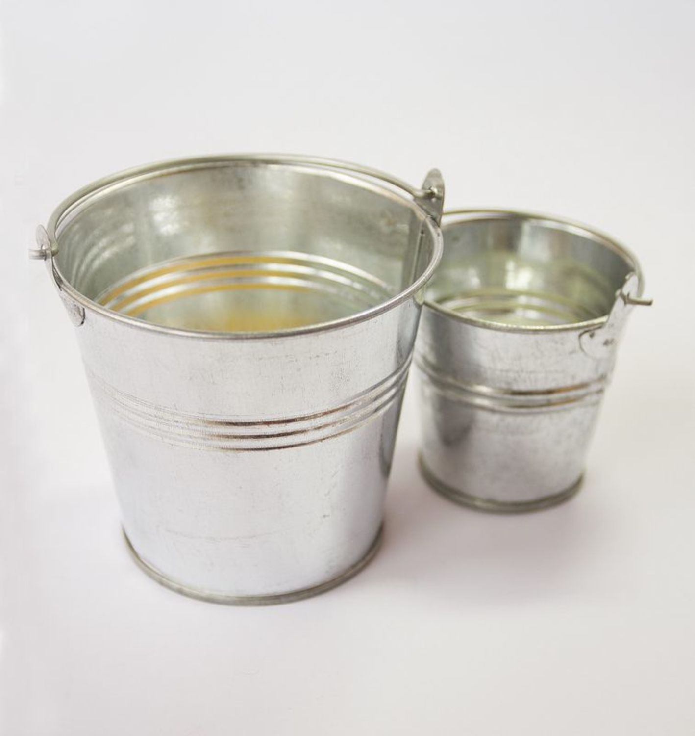 Candle holder in the form of a metal pail photo 3