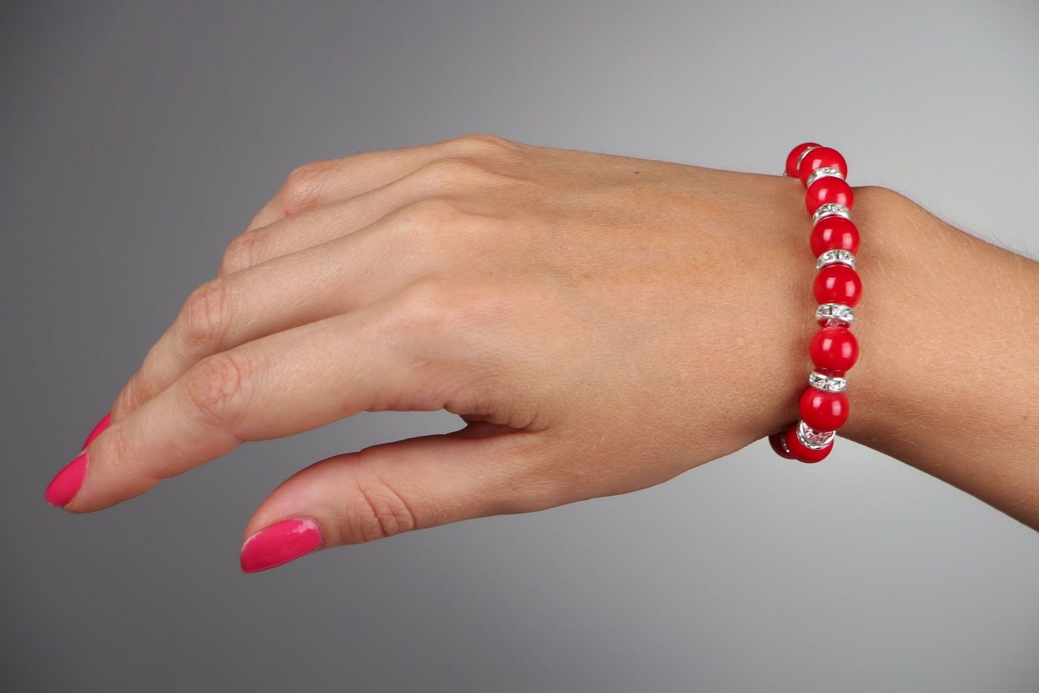 Bracelet made of natural coral on elastic band photo 5