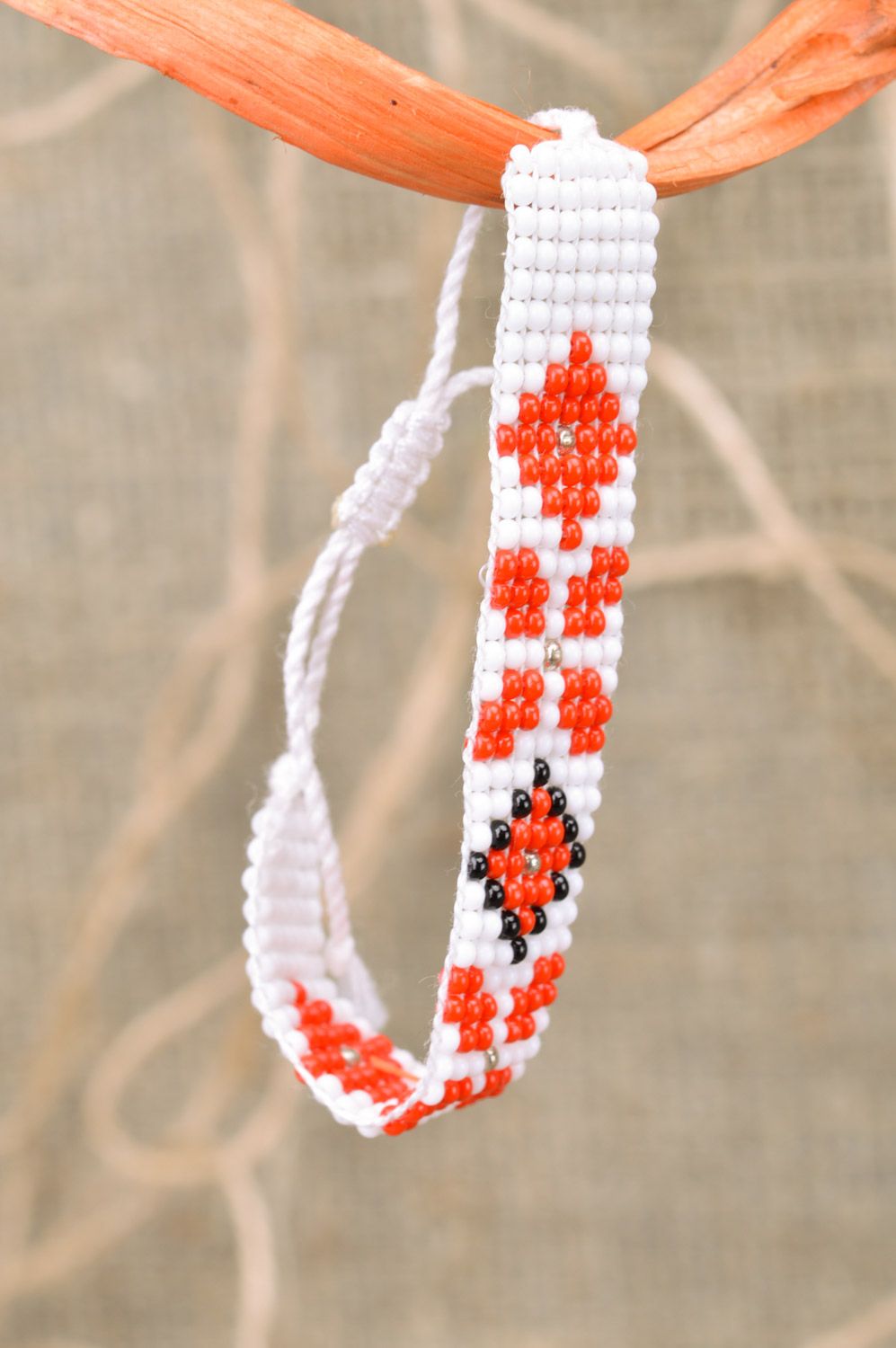 Handmade women's woven bead bracelet of white color with ornament photo 1