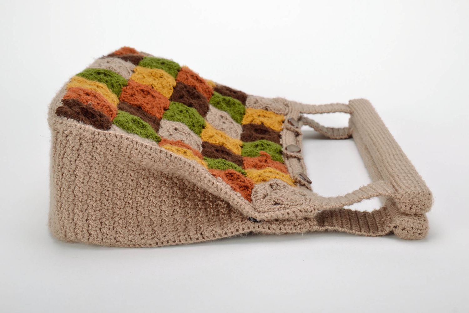 Knitted bag with wooden handles photo 3