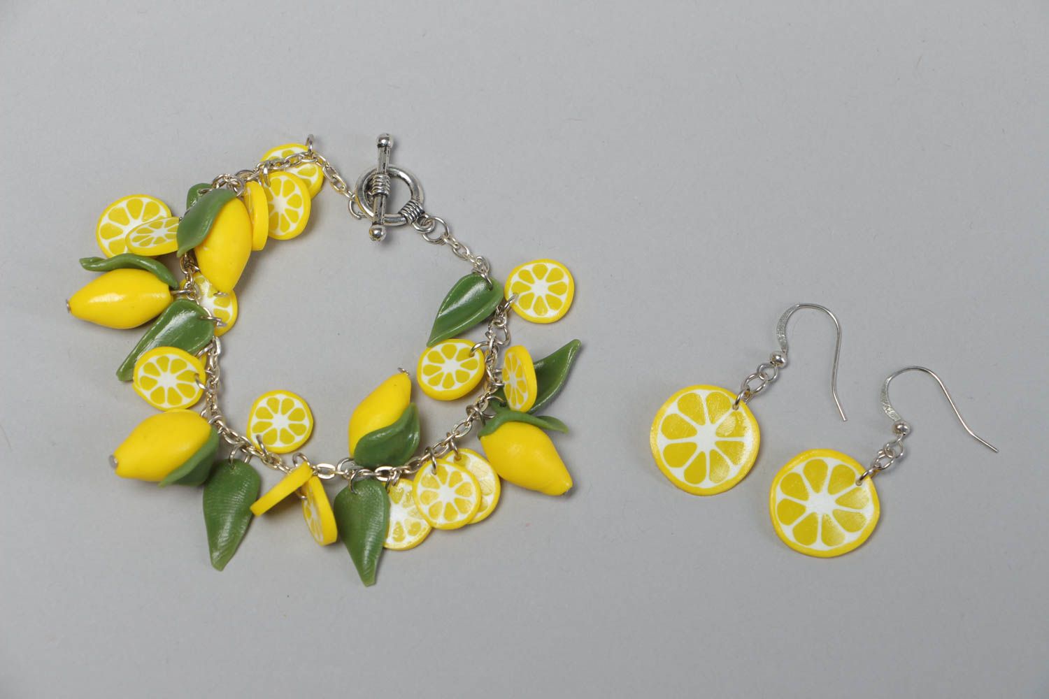 Set of handmade jewelry accessories made of polymer clay earrings and bracelet photo 1