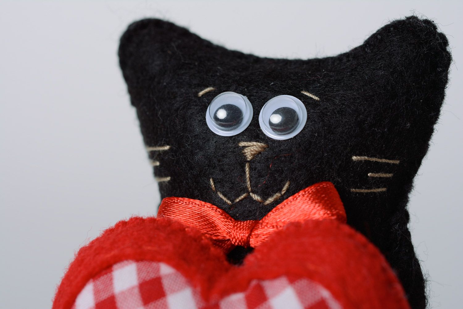 Handmade beautiful soft toy made of felt cute black cat with red heart  photo 2