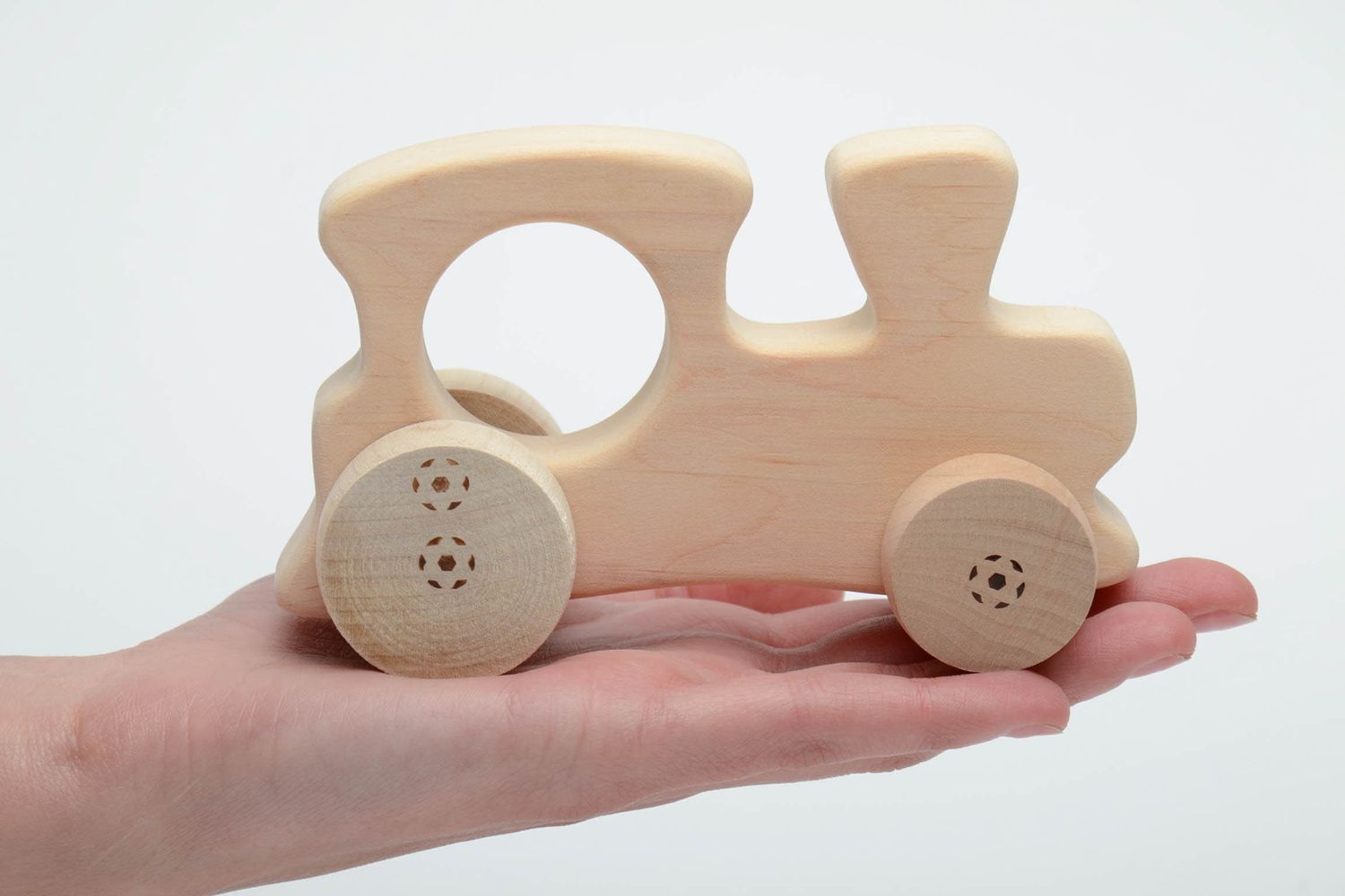 Wheeled toy made of light wood Train photo 2