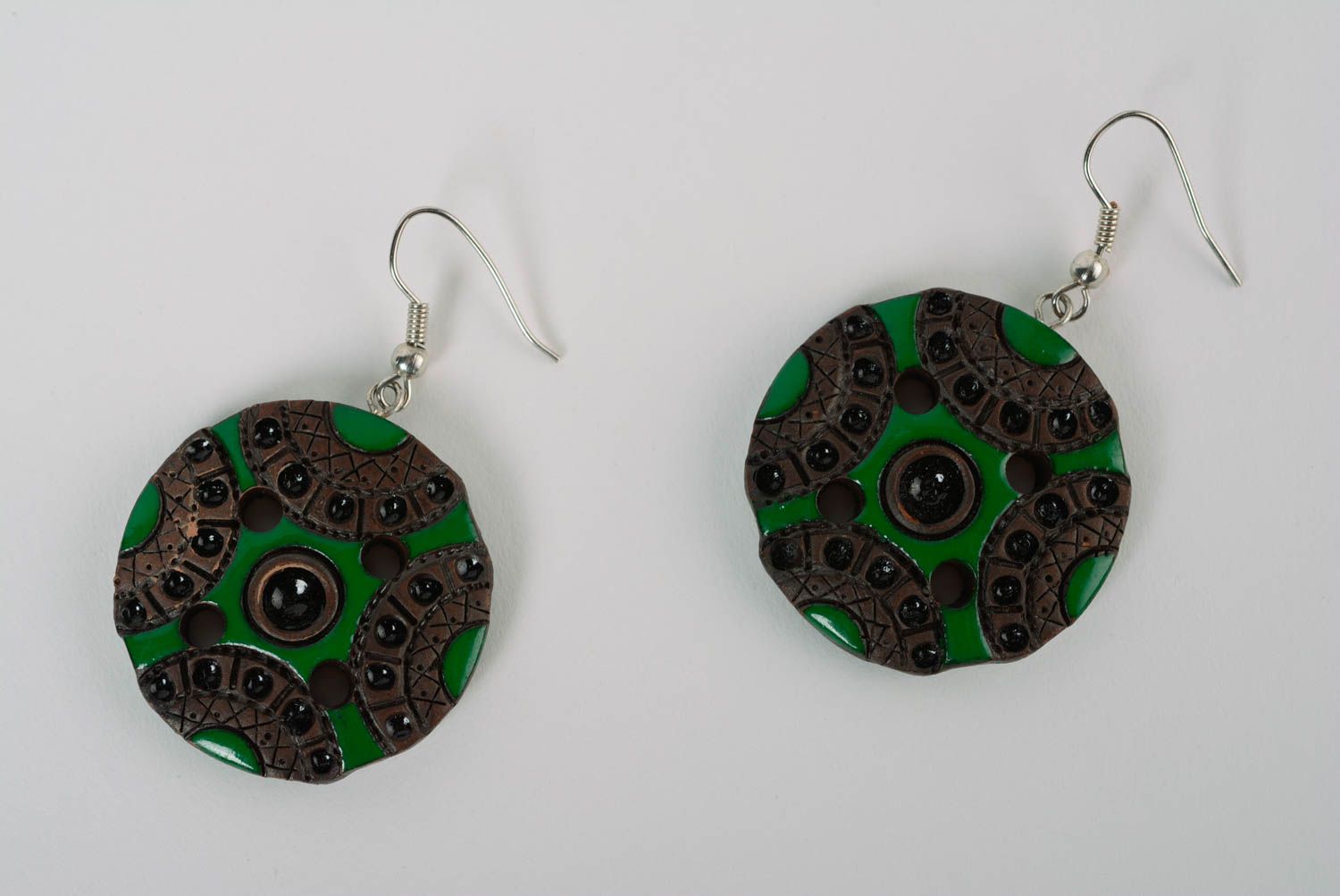 Handcrafted designer unique round ceramic earrings with colored enamel paintings   photo 1