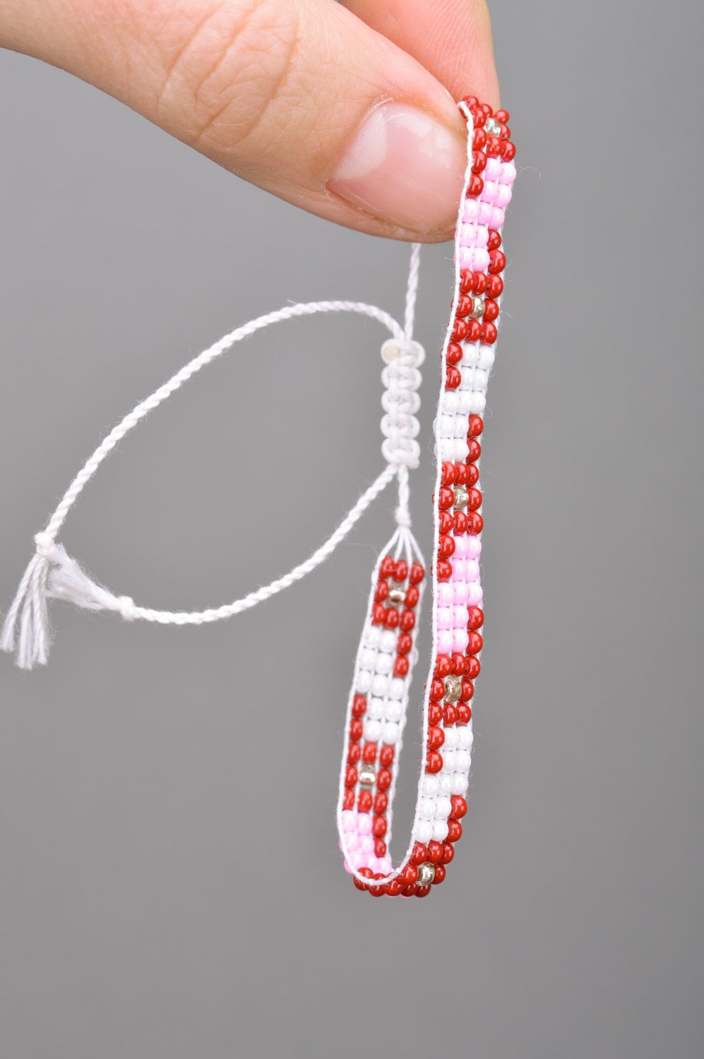 White and red handmade women's thin beaded wrist bracelet with ties photo 3