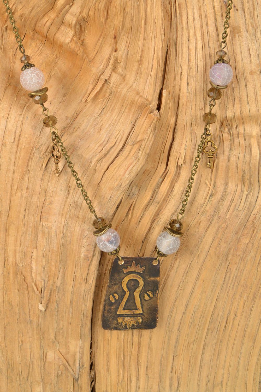 Collier pendentif en laiton avec agate Une serrure photo 1