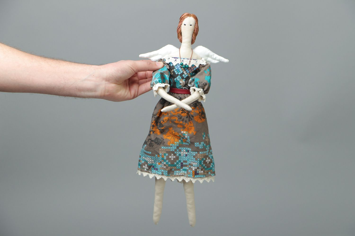 Muñeca de tela artesanal foto 4