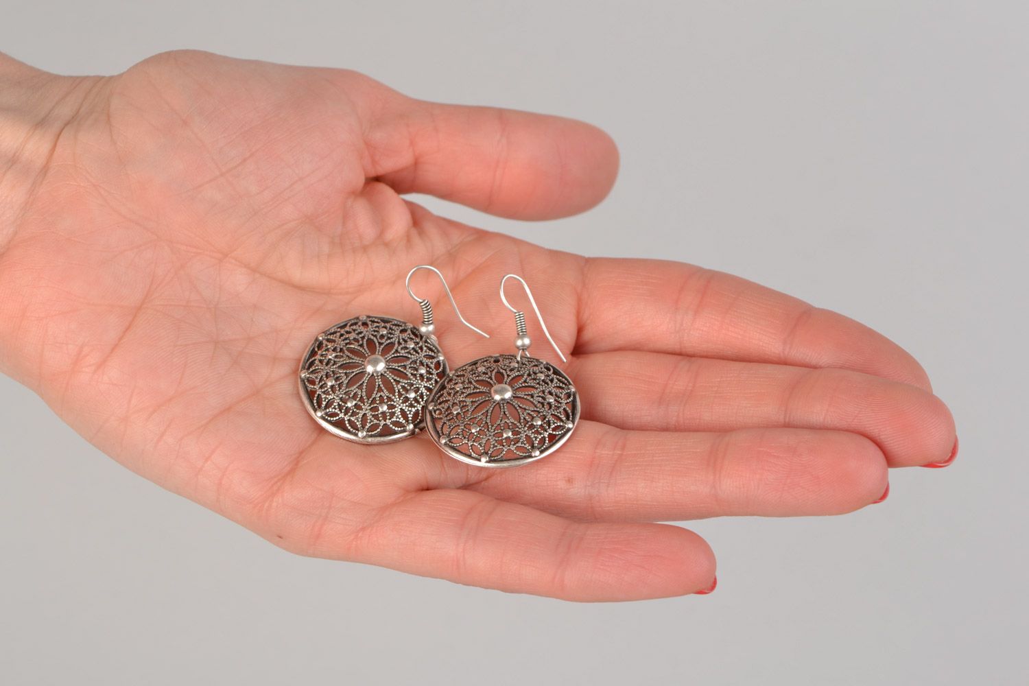 Handmade round lacy dangling earrings cast of metal alloy in ethnic style photo 2