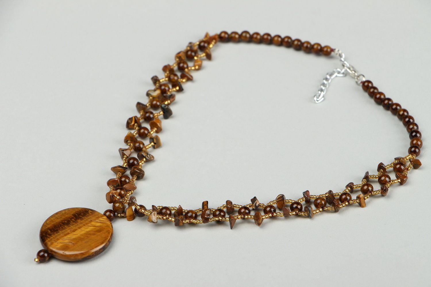 Necklace made of beads and tiger's eye stone photo 1