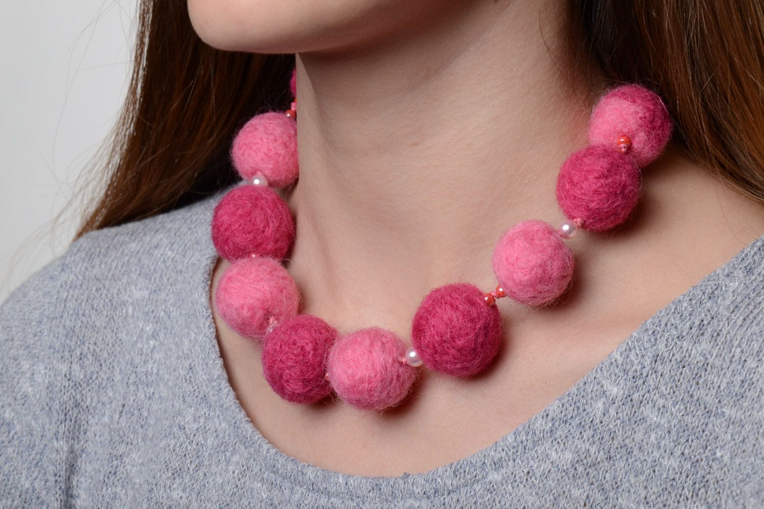 Beautiful pink soft wool ball necklace created using wet felting technique photo 1